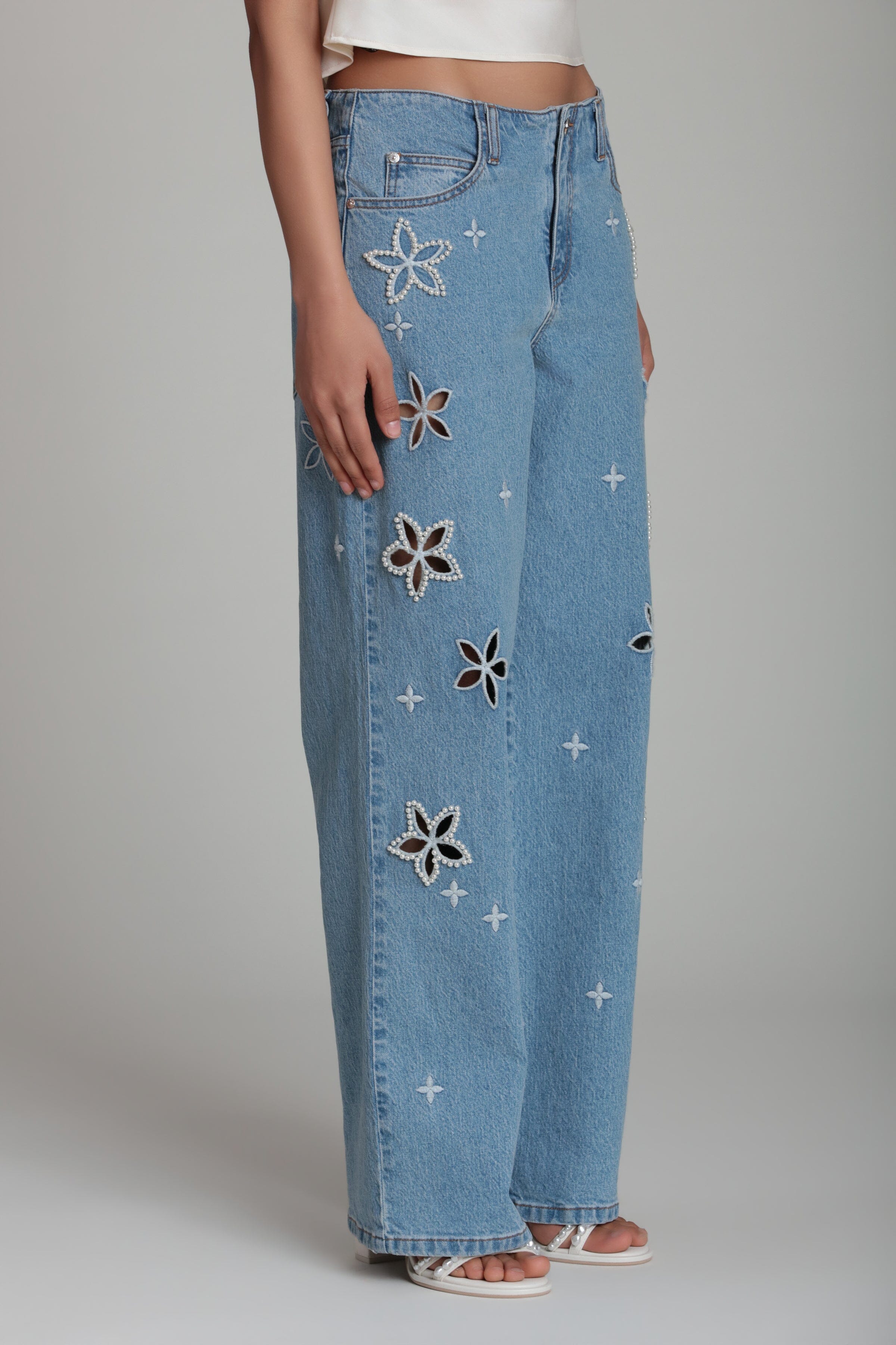 Wide leg light wash jeans with a mid-rise and pockets - Shop designer embroidered denim jeans for women by Avec Les Filles