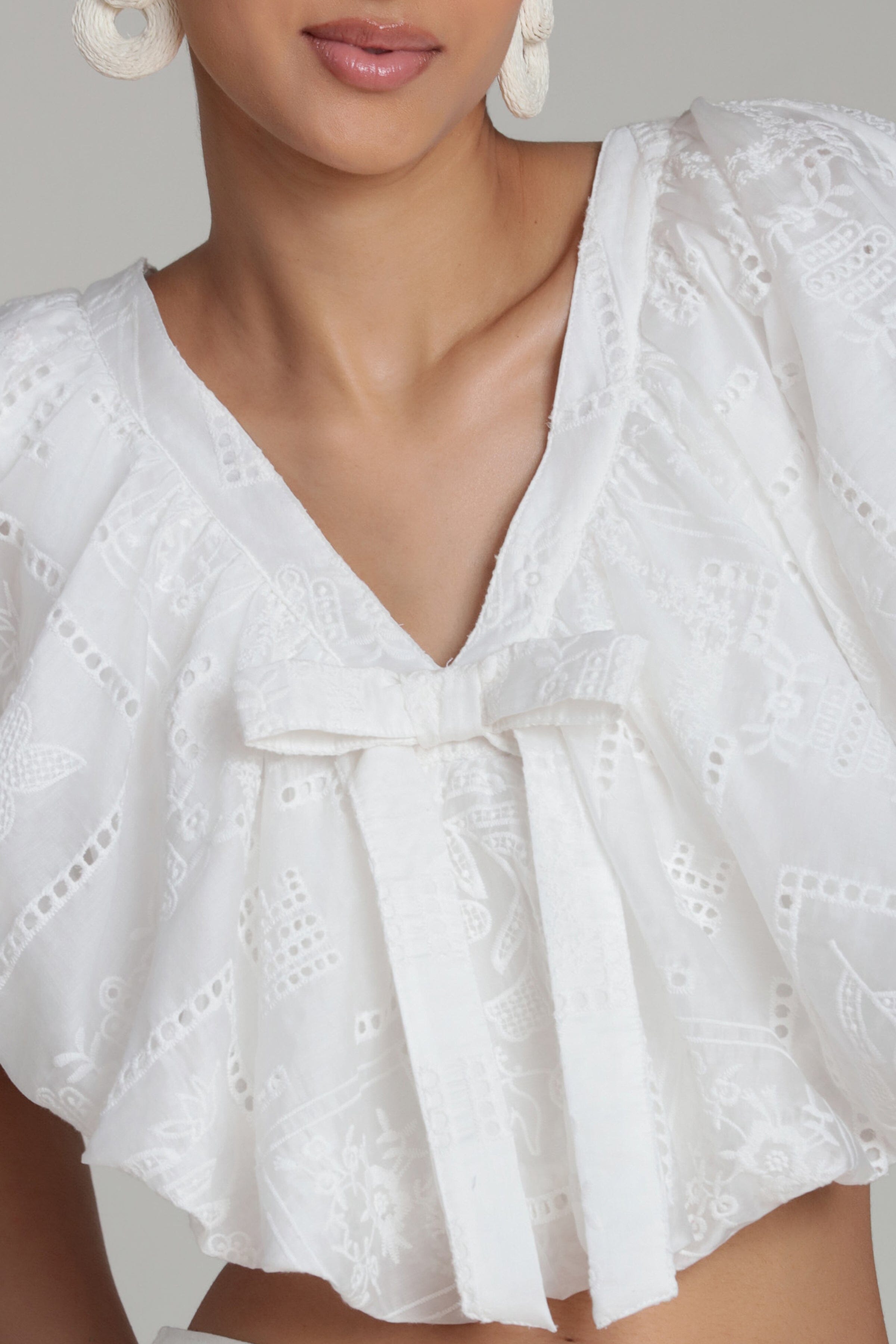Embroidered white ruffle crop top with a deep V-neckline - Shop designer women's cute crop tops by Avec Les Filles