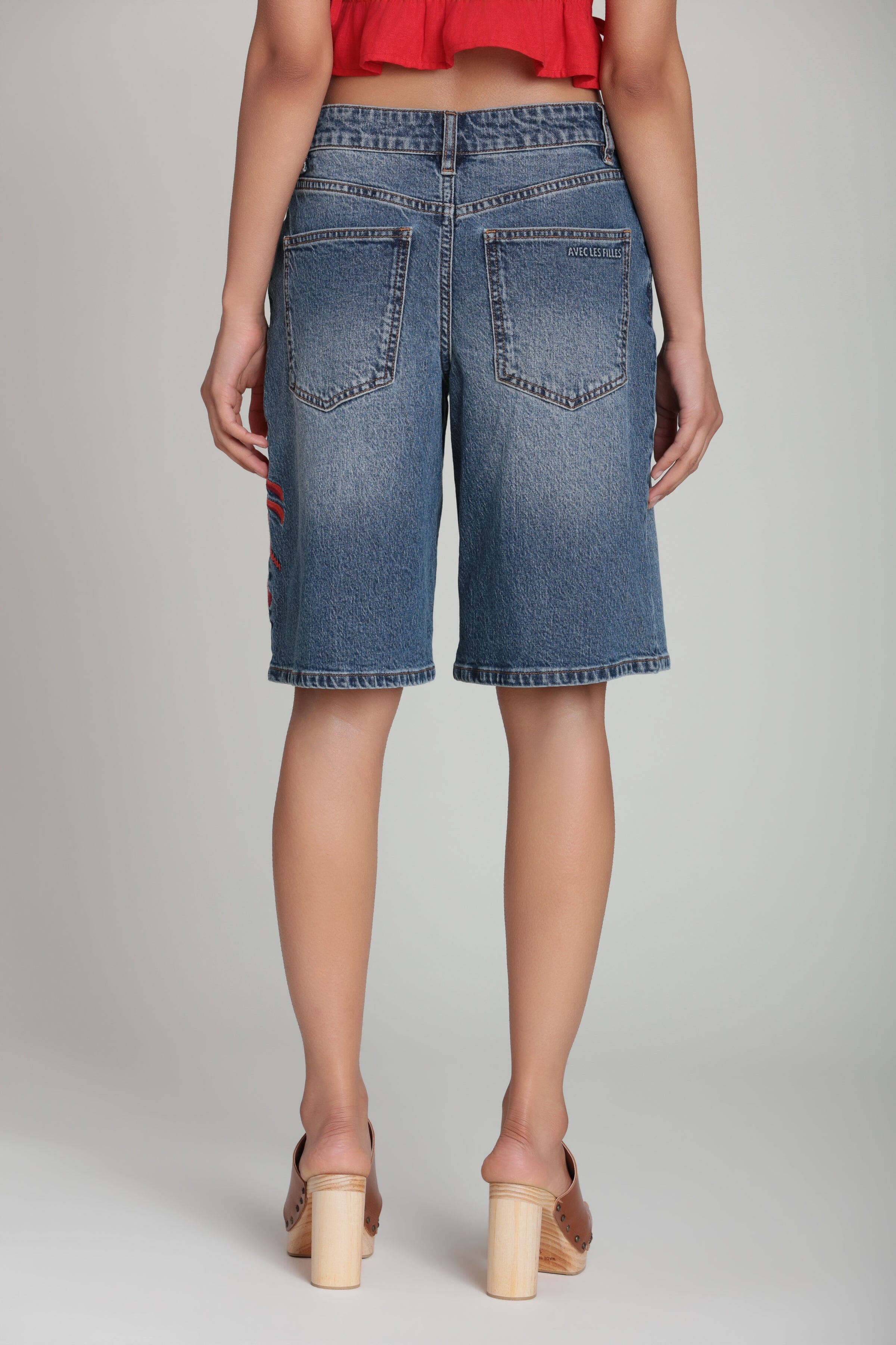 Wide-leg blue embroidered denim shorts in cotton blend with a high-rise waist - Shop cute denim shorts by Avec Les Filles.