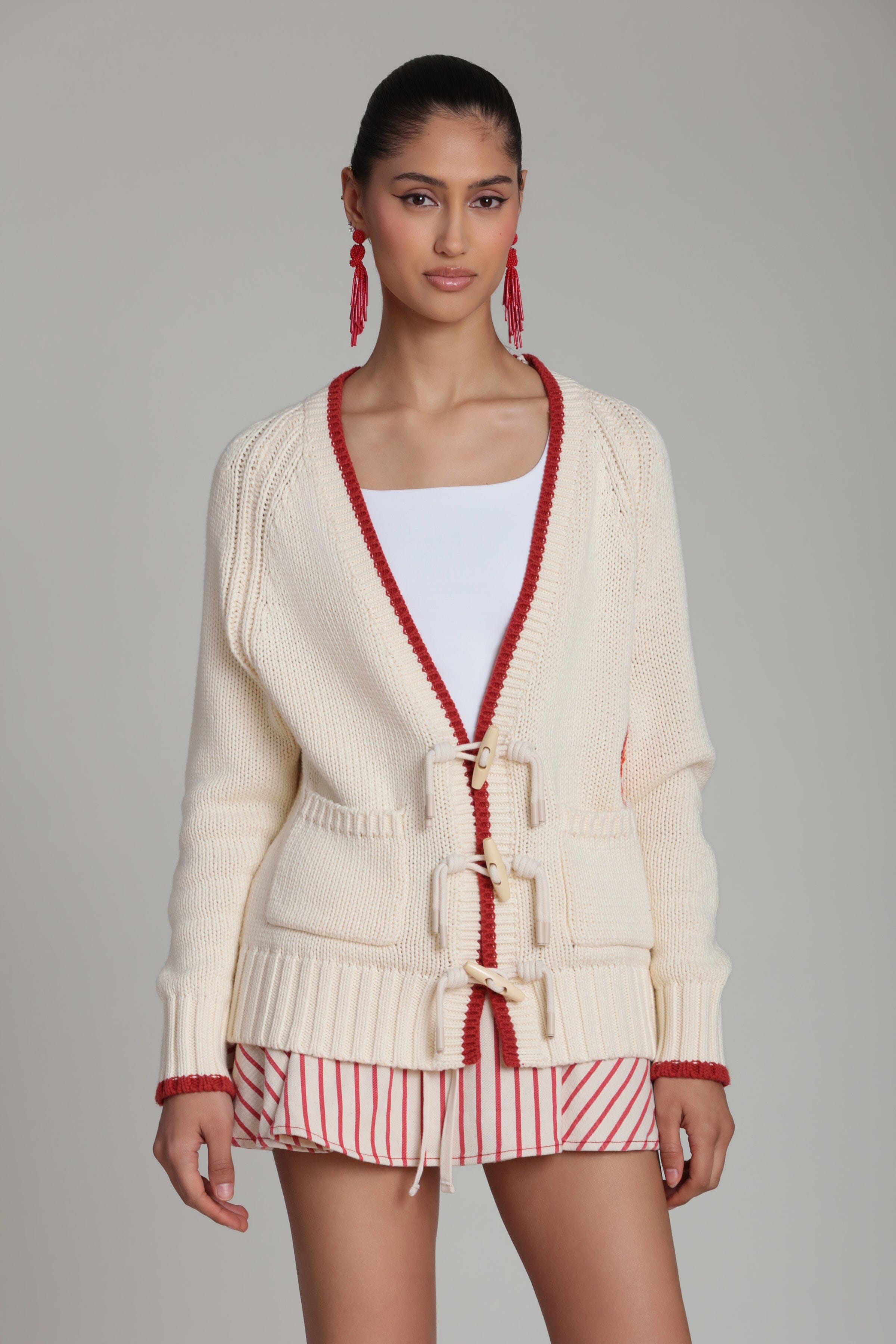 Cotton ivory and red intarsia cardigan with deep V-neck and raglan sleeves - Shop designer cardigans by Avec Les Filles