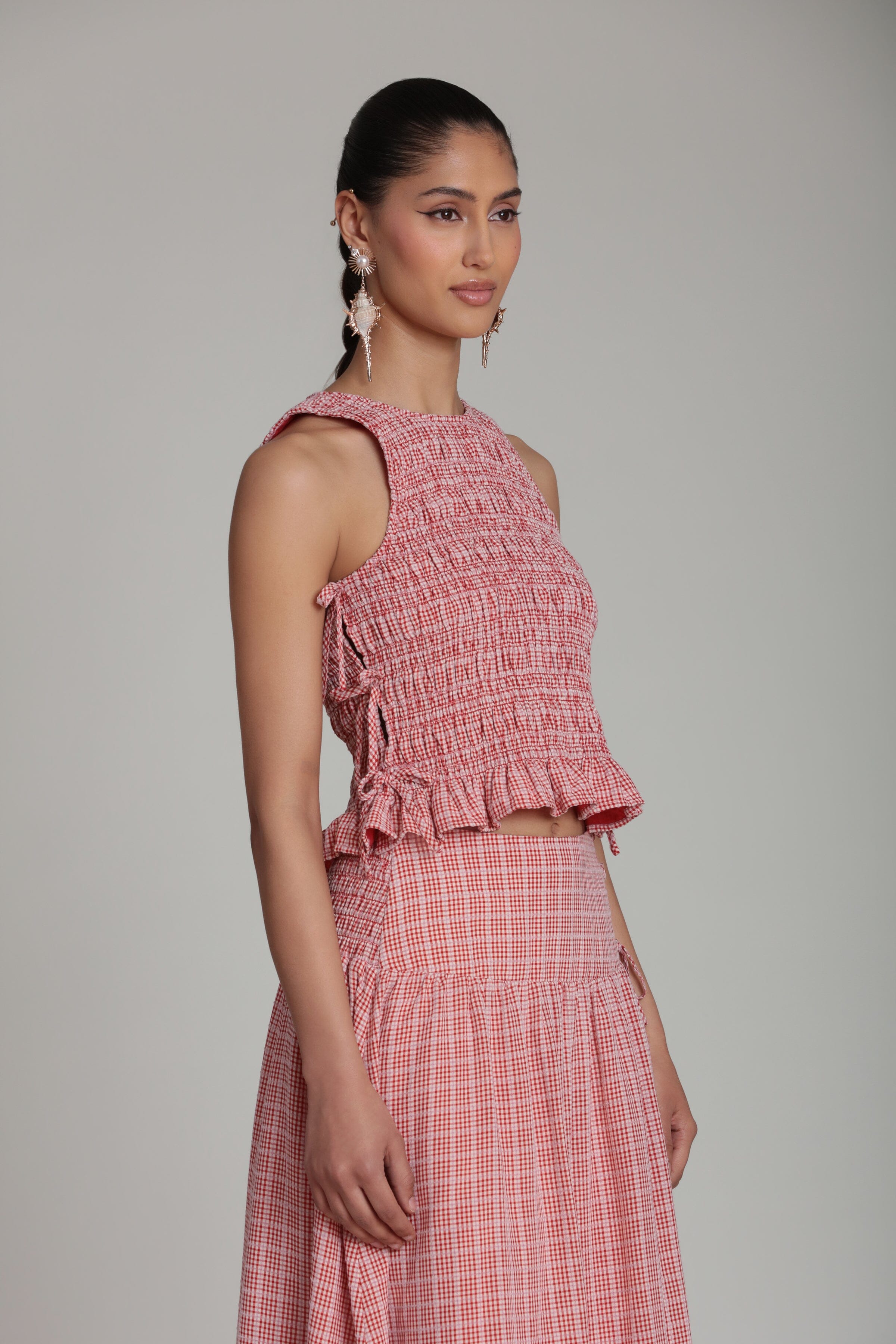 Sleeveless red gingham tank top with ruffle hem - Shop designer women's tank tops by Avec Les Filles.
