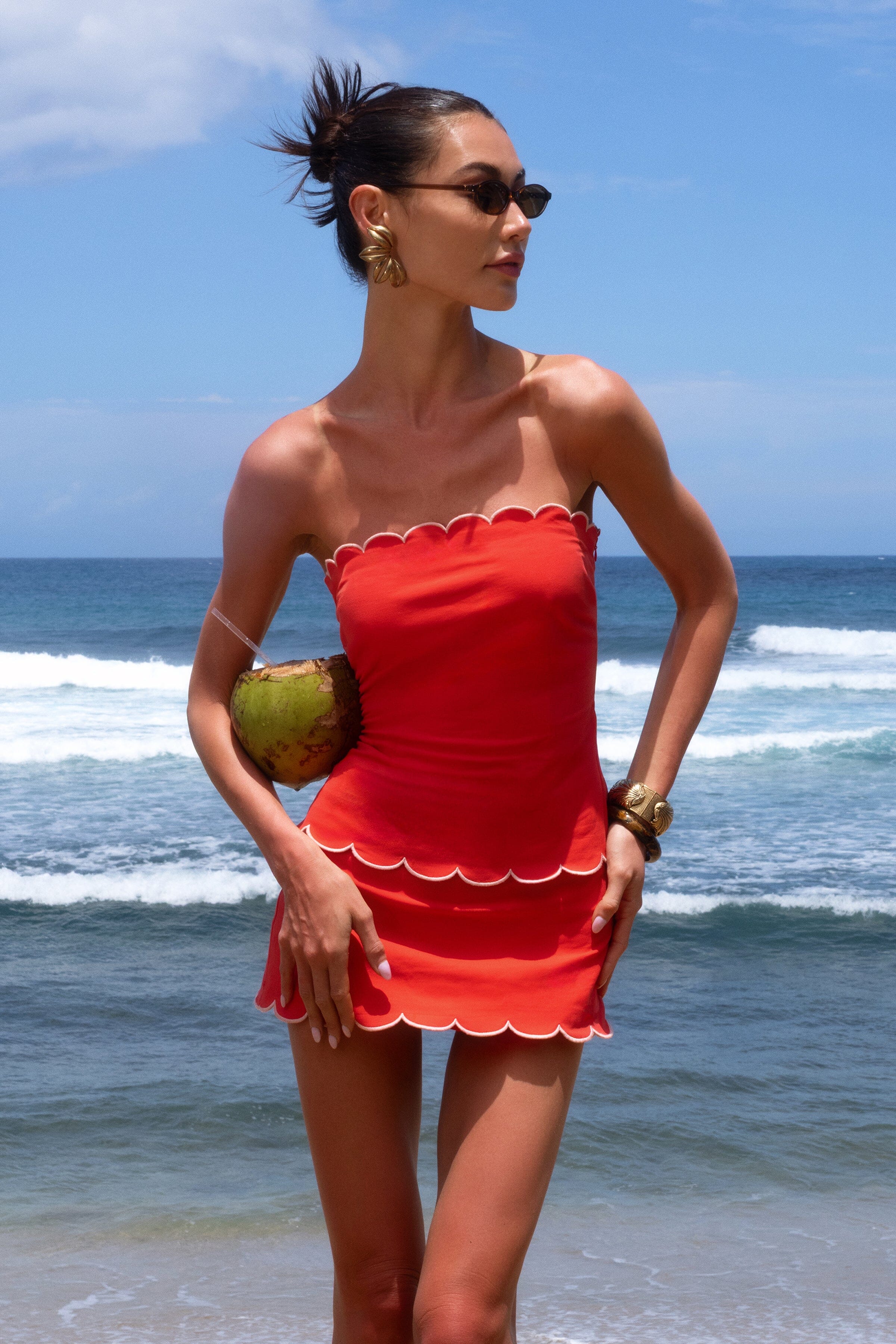 Scalloped convertible red cotton top with  removable adjustable straps and low rise skorts by Avec Les Filles