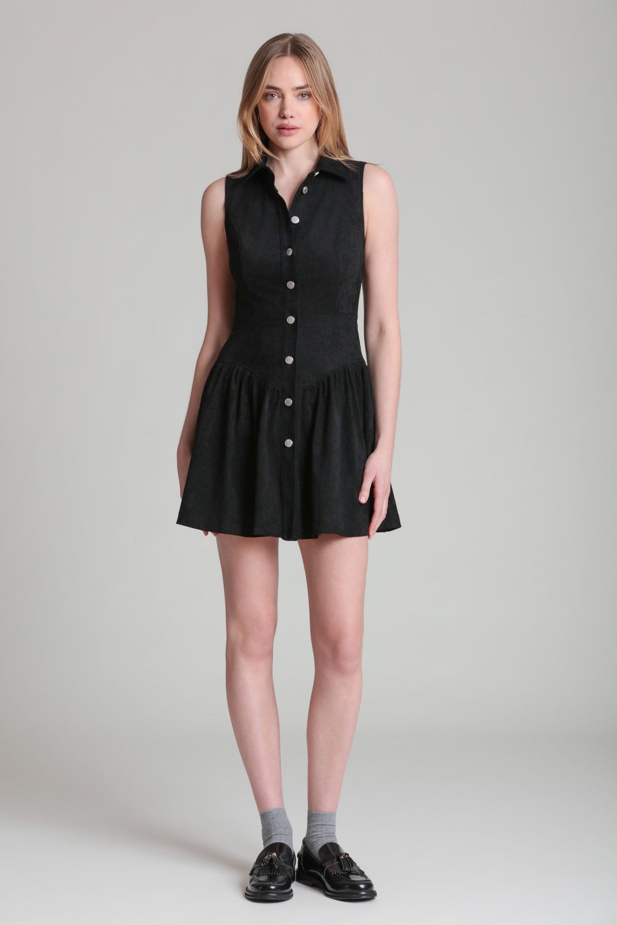 Sleeveless black mini dress with a drop waist and point collar - Shop women's cute mini dresses by Avec Les Filles.
