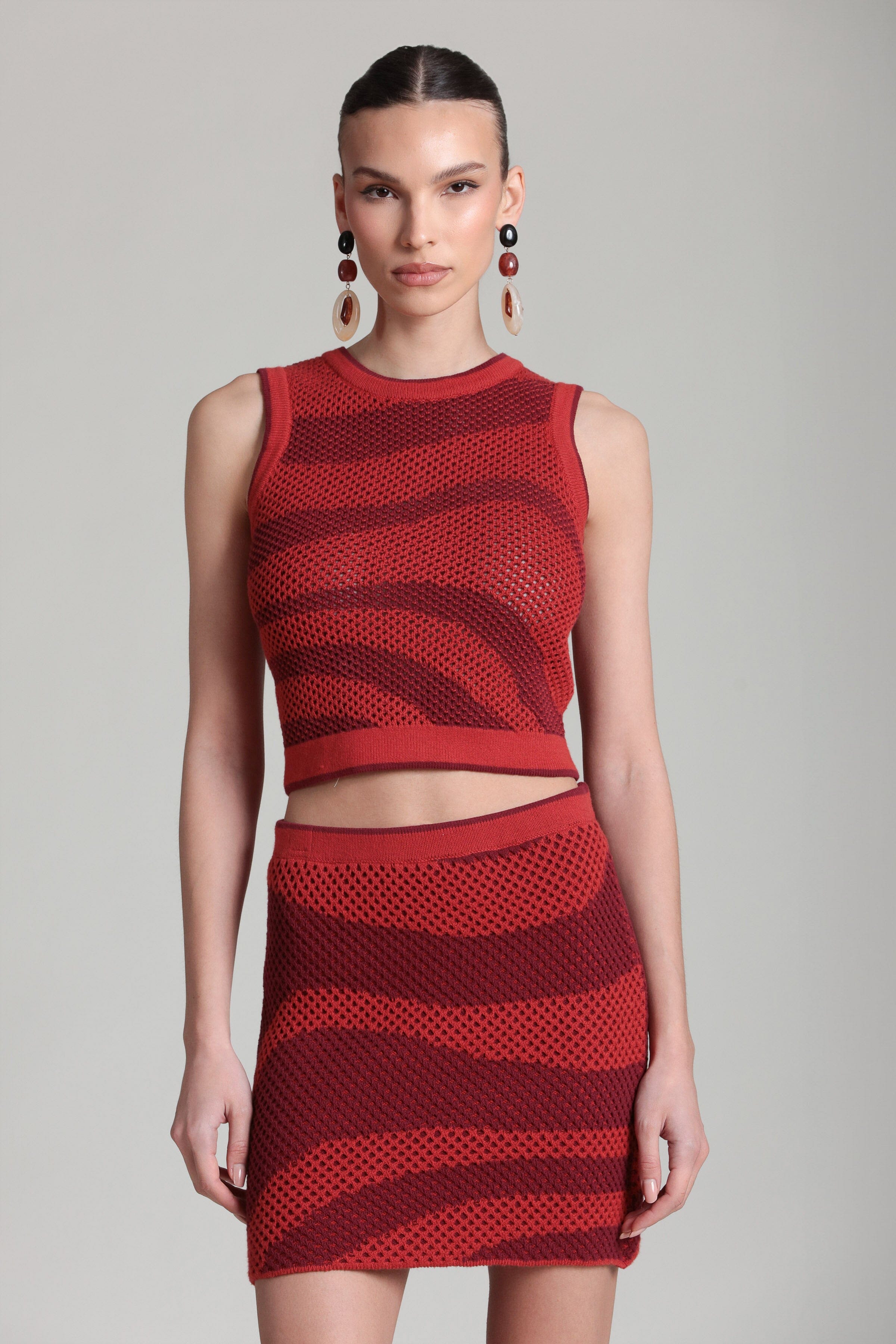 Red mesh tank top in cotton blend with mini red skirt - Shop designer women's mesh tops & mini skirts by Avec Les Filles.