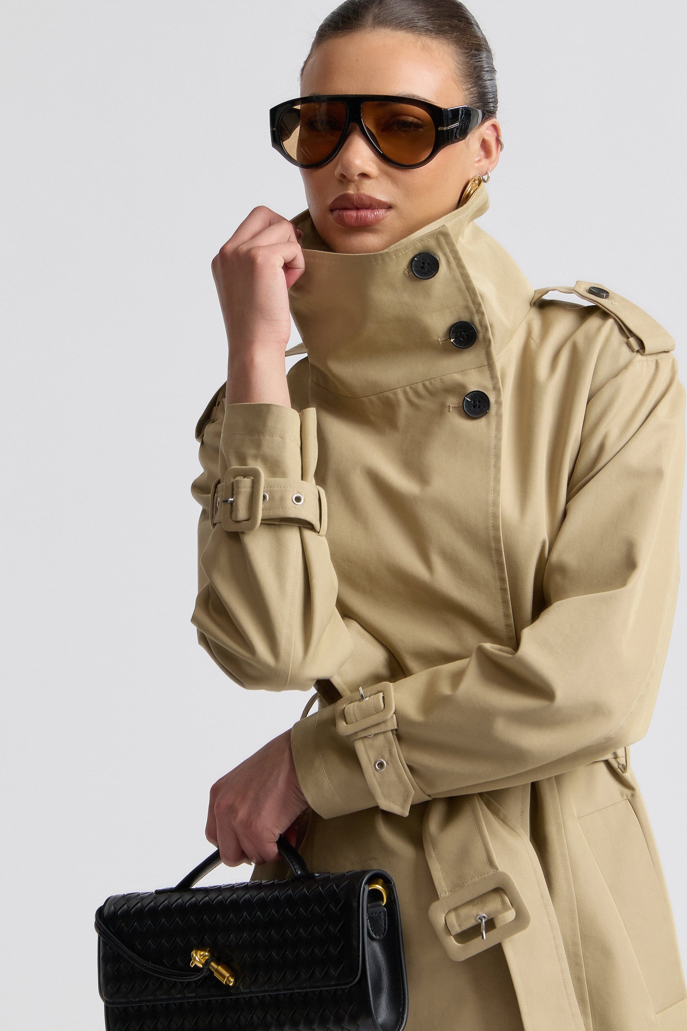 Beige trench coat with buckle-adjustable long sleeves and button-front - Shop women's trench coats by Avec Les Filles