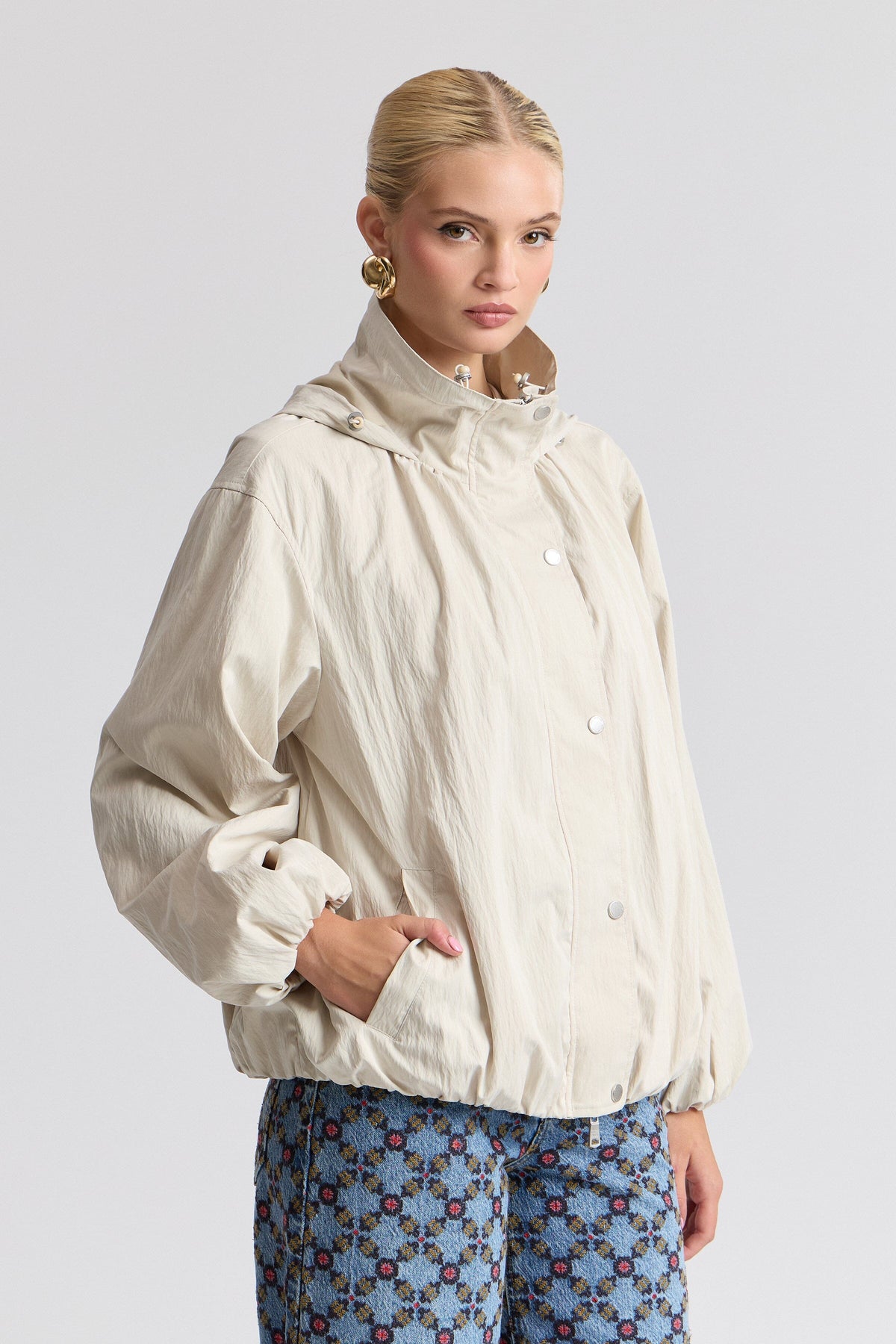 Nylon-blend women's windbreaker jacket with balloon sleeves. Shop designer white jackets by Avec Les Filles.