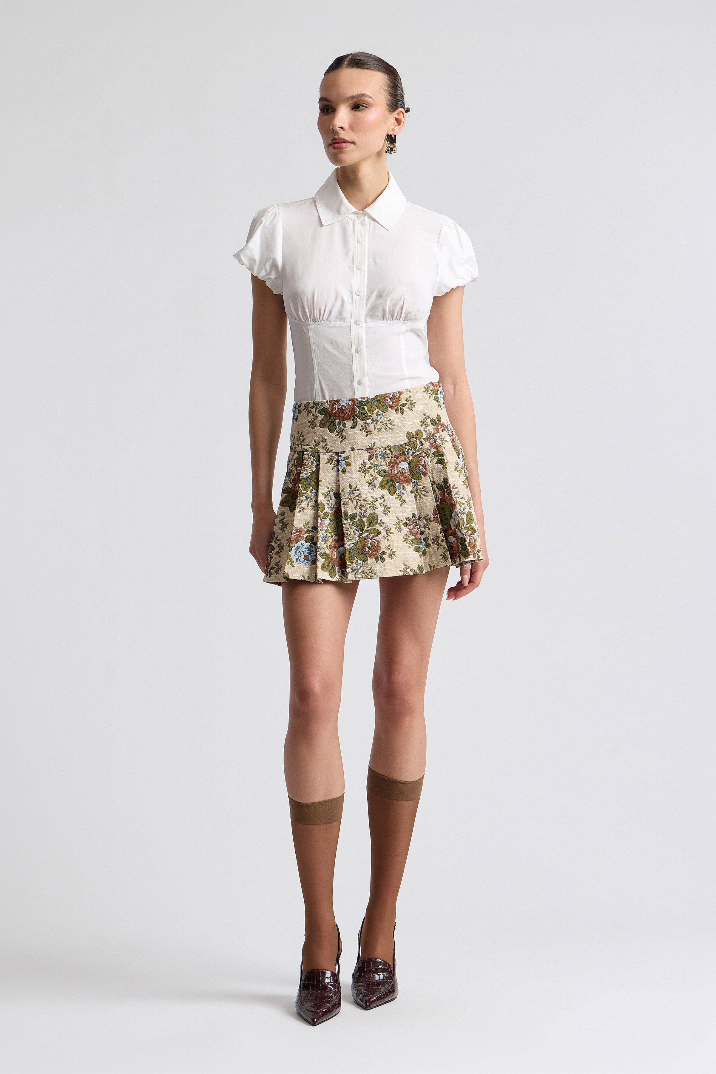 Floral taupe skirt brocade with knife-pleated design. Shop designer women's cute mini skorts by Avec Les Filles.