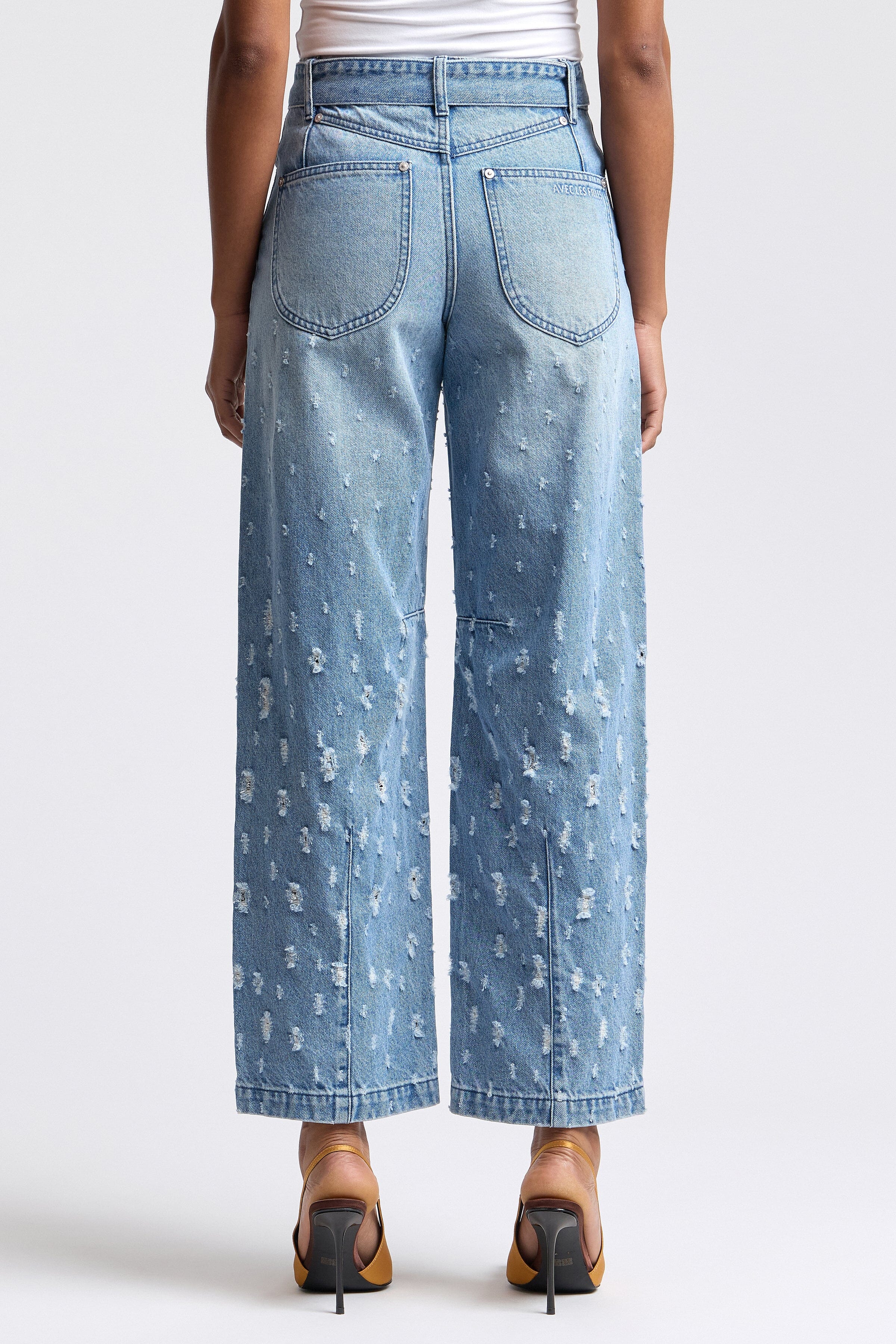 Blue distressed denim pants​ in cotton with wide-leg fit and removable belt - Shop women's denim jeans by Avec Les Filles.