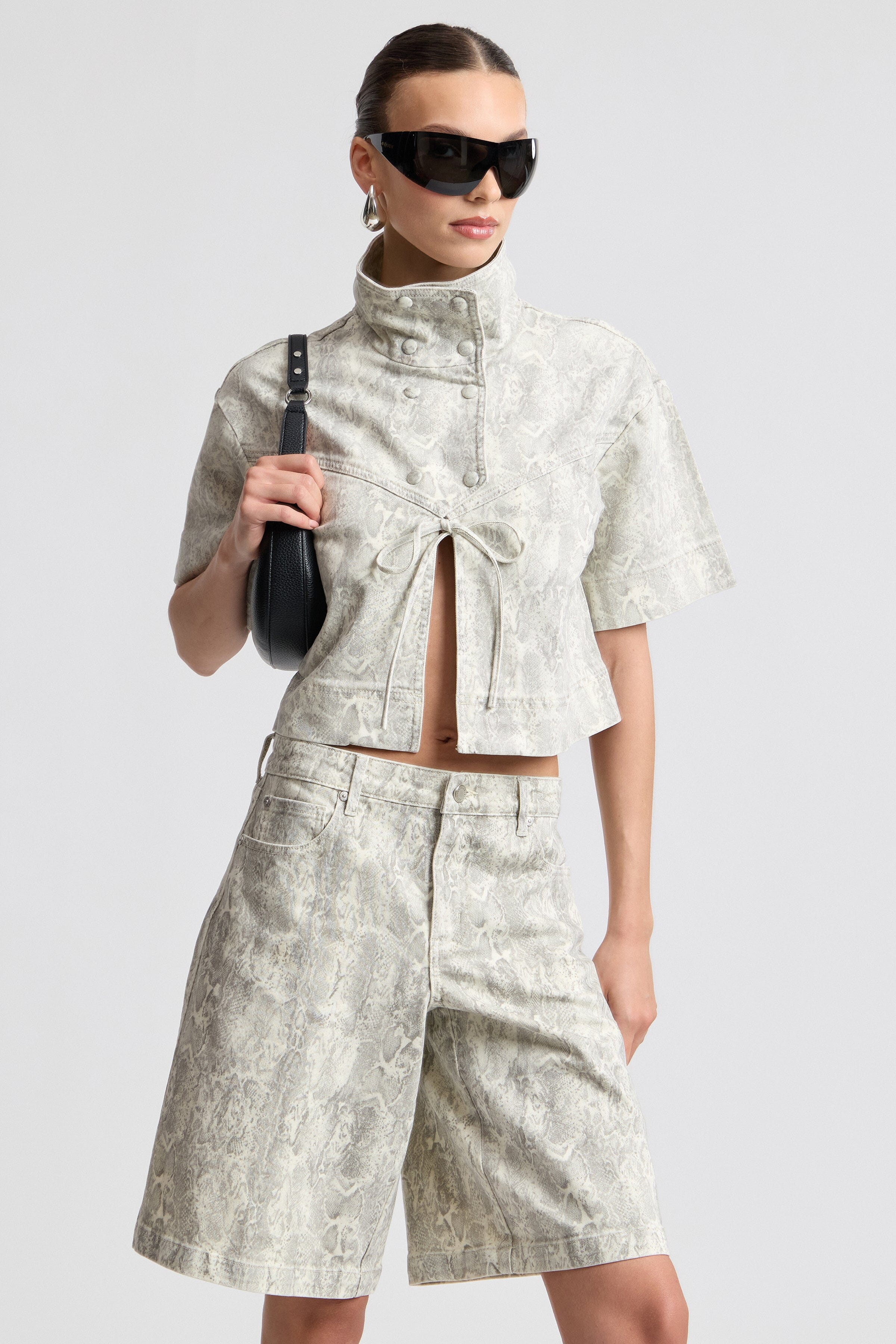 Snake print shorts​ with short sleeve jackets. Shop designer women's shorts & jackets by Avec Les Filles.