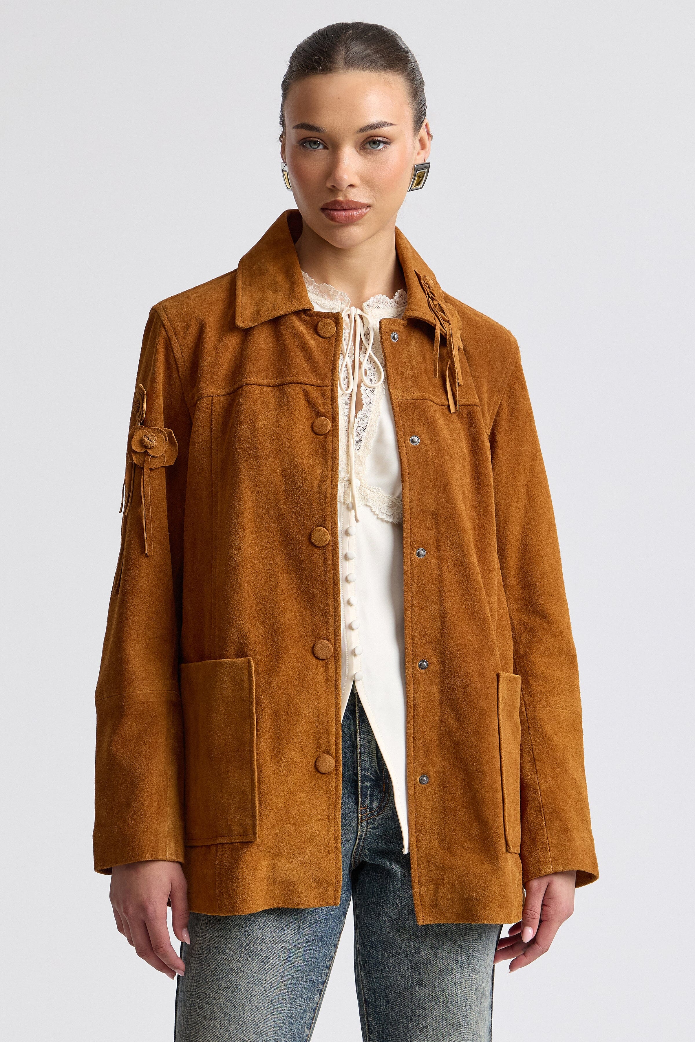 Floral appliqué genuine brown suede shirt jacket shacket with snap front and long sleeves by Avec Les Filles