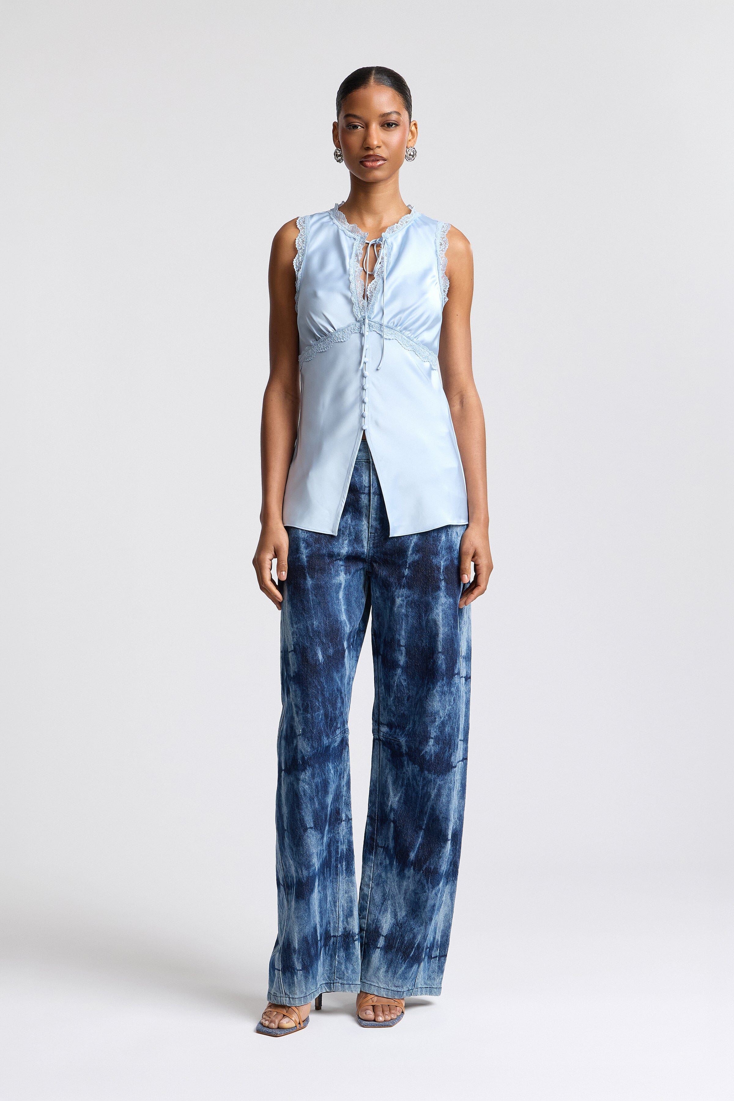 Satin light blue blouse with empire waist and adjustable tie - Shop women's cute sleeveless tops by Avec Les Filles.