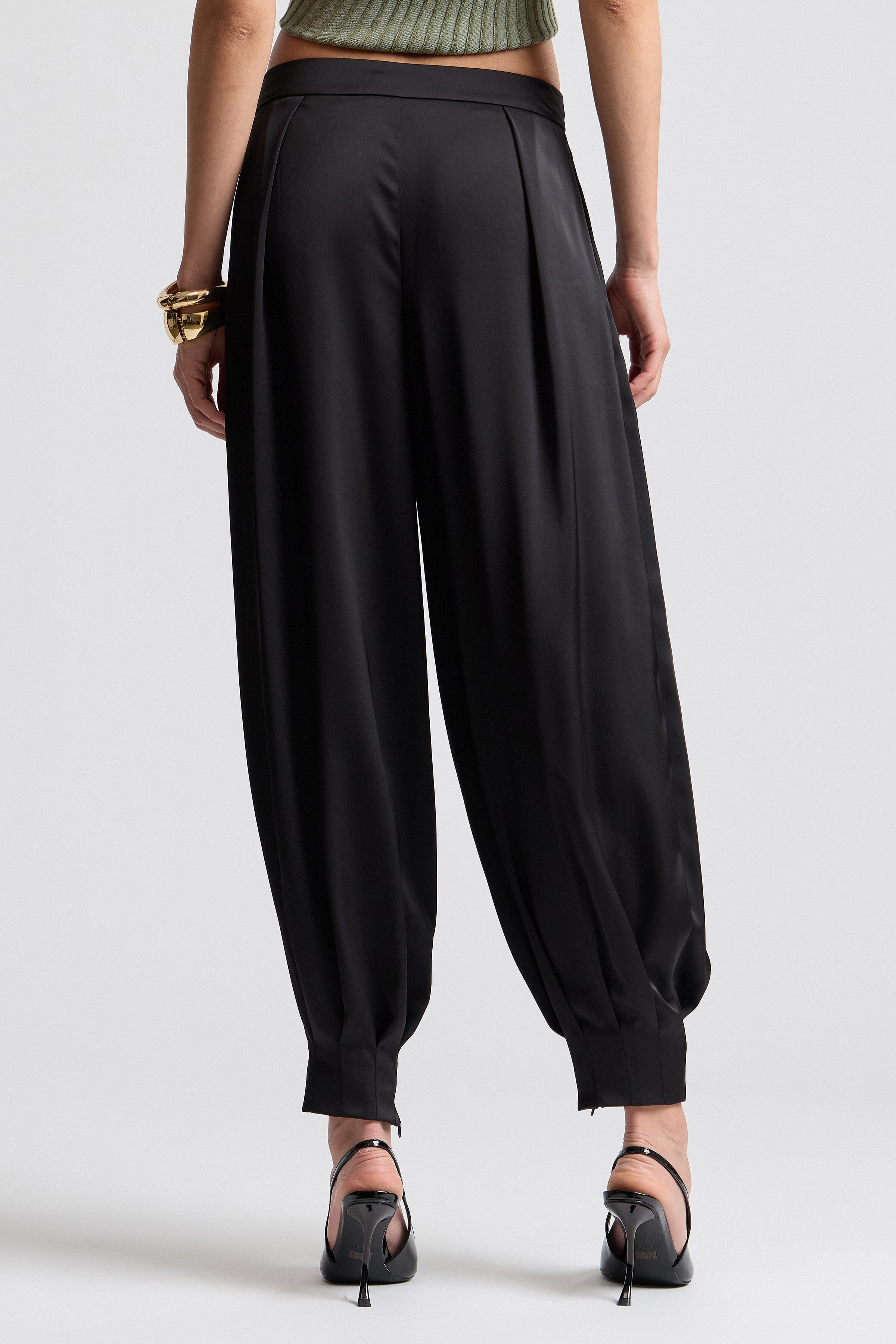 Black women's satin balloon pants. Shop designer women's pants by Avec Les Filles.