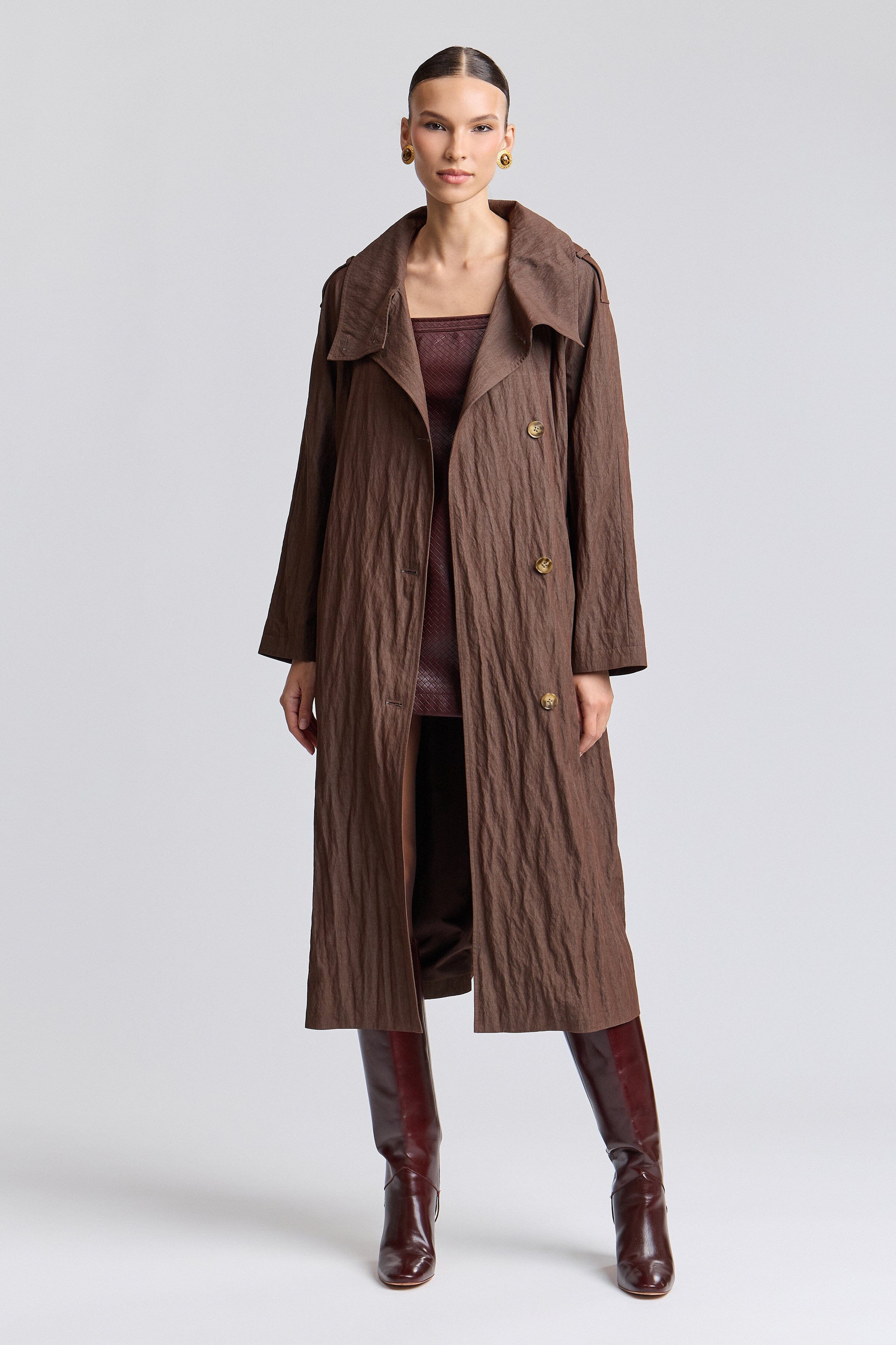 Women's trench coat is crafted from lightweight crinkle fabric - Shop cute trench coats by Avec Les Filles.