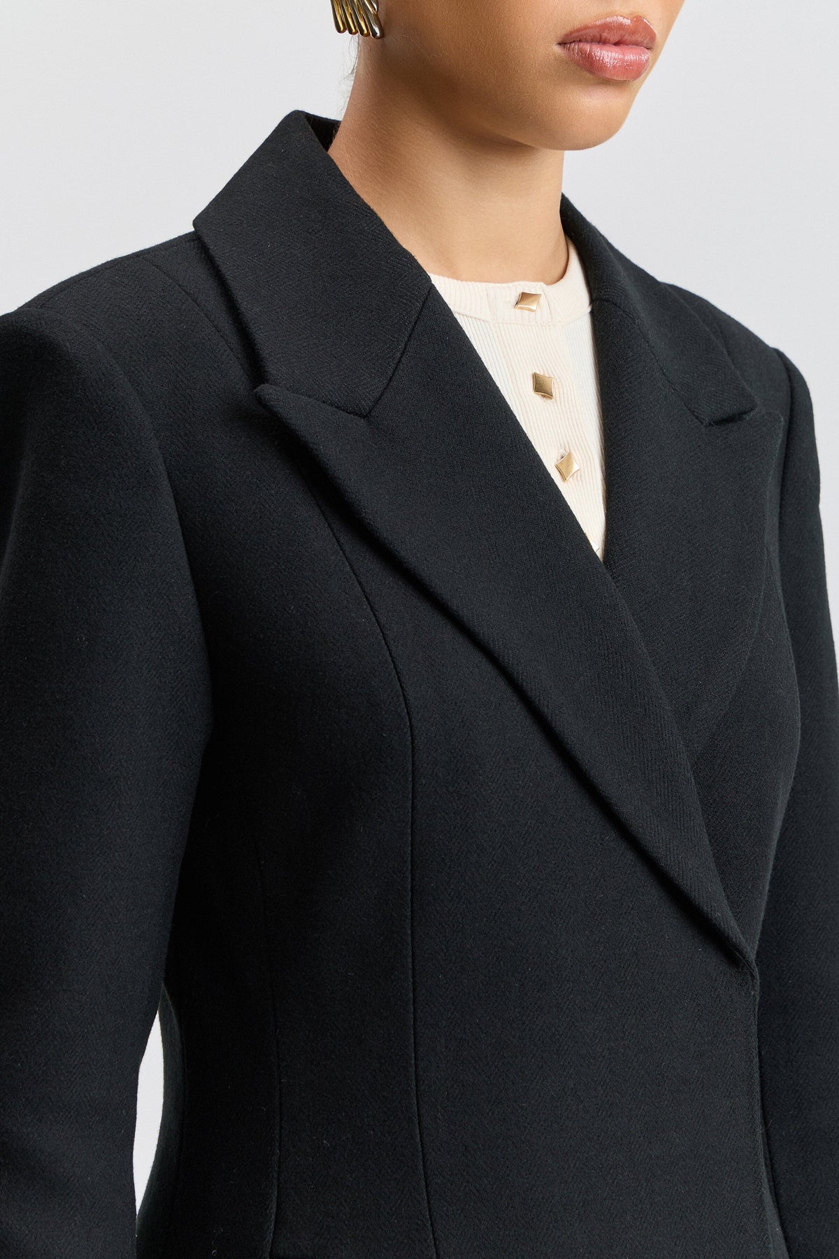 Fit-and-flare womens long black overcoat in wool blend with button- front - Shop designer coats by Avec Les Filles.