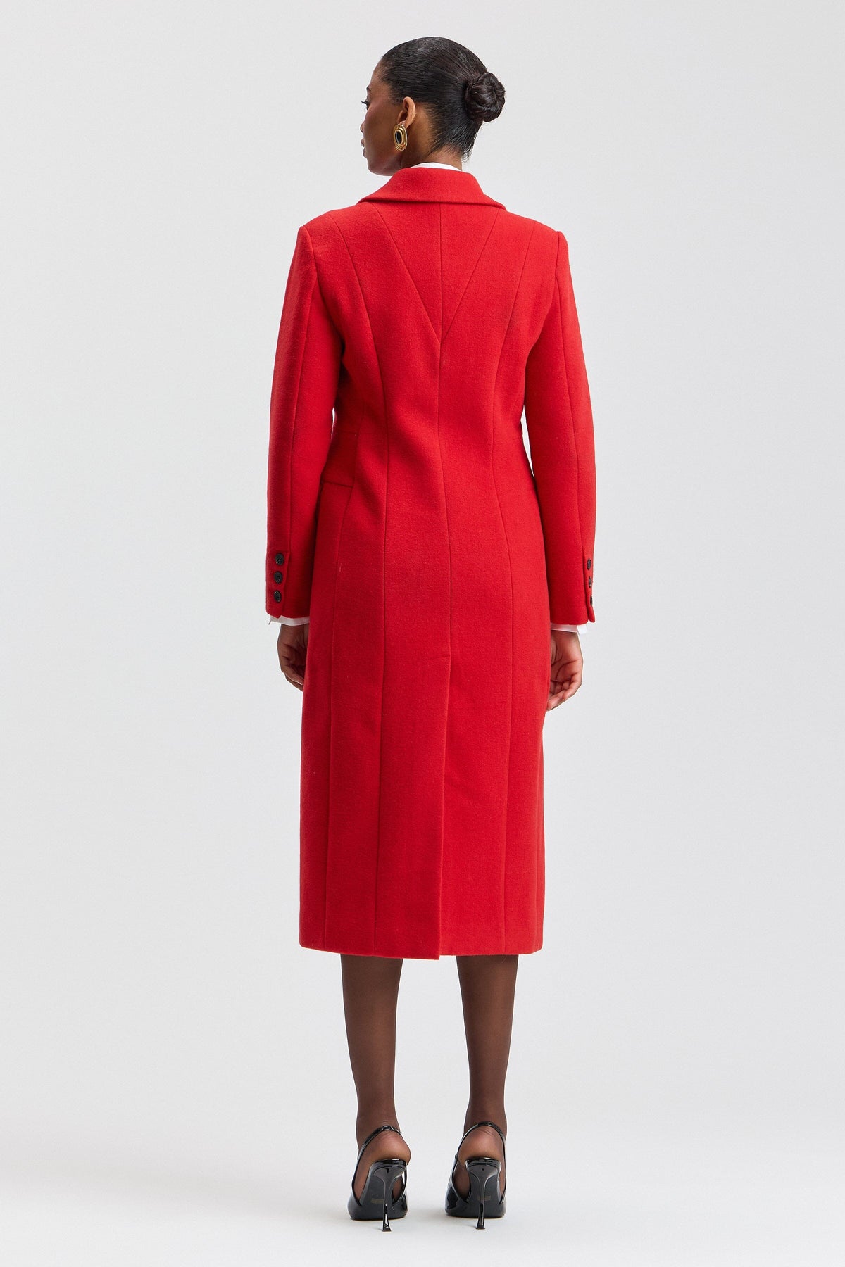 Wool-blend long red winter coat with a notched lapel collar. Shop women's cute long coats by Avec Les Filles.