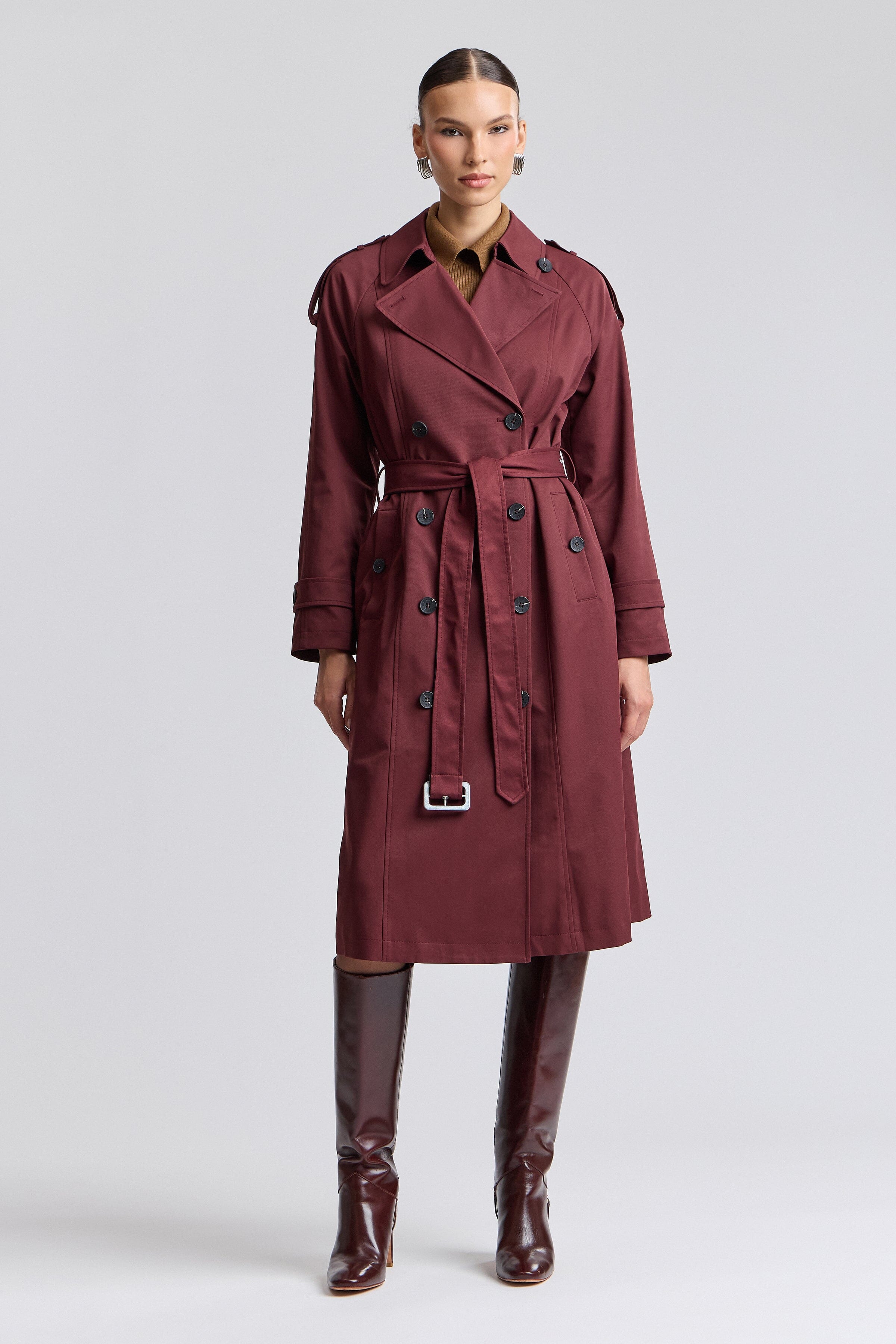 Oversized burgundy trench coat with long raglan sleeves and a belted waist - Shop women's trench coats by Avec Les Filles.