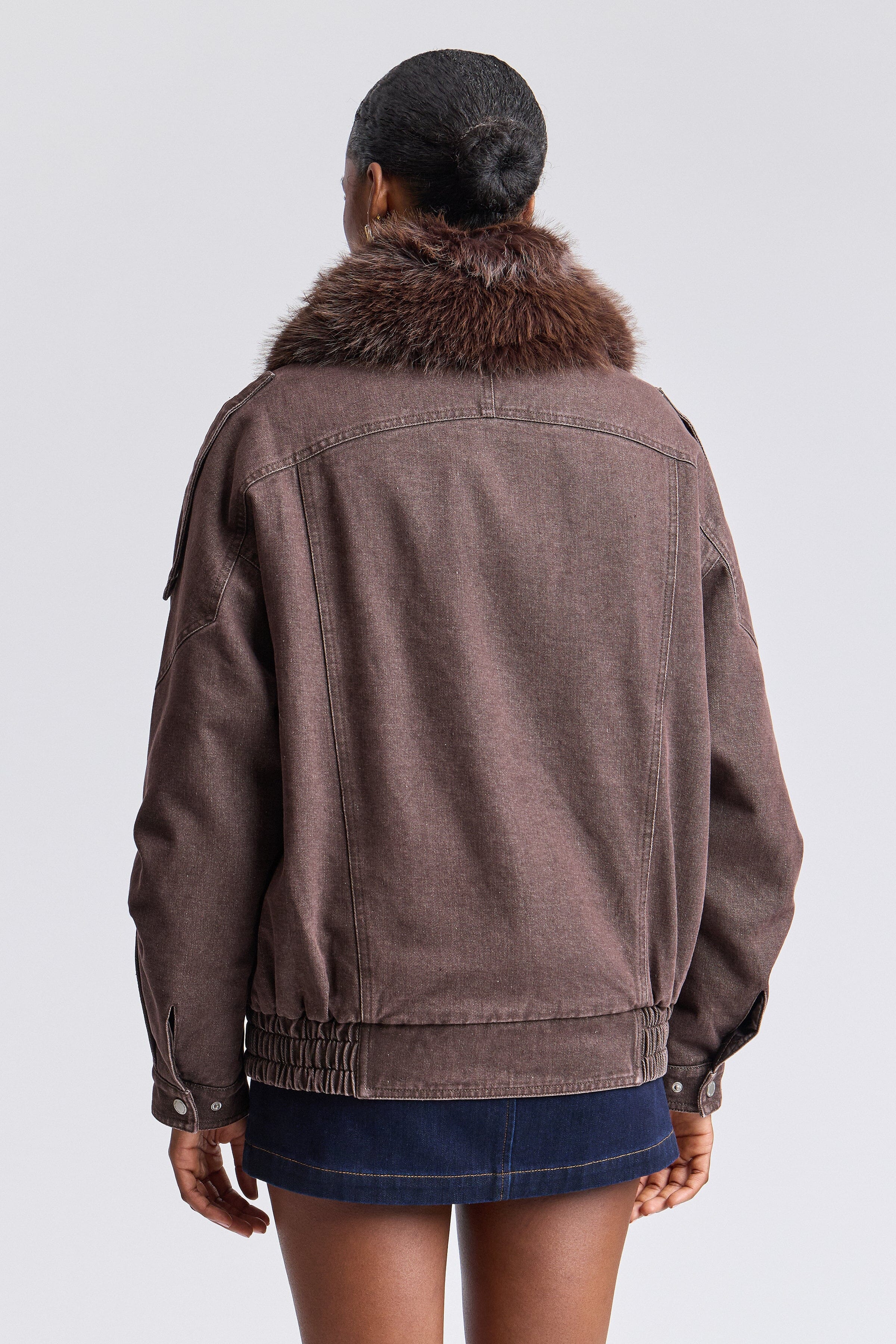 brown oversized jean jacket with fur trim and long sleeves - Shop women's bomber jackets by Avec Les Filles.