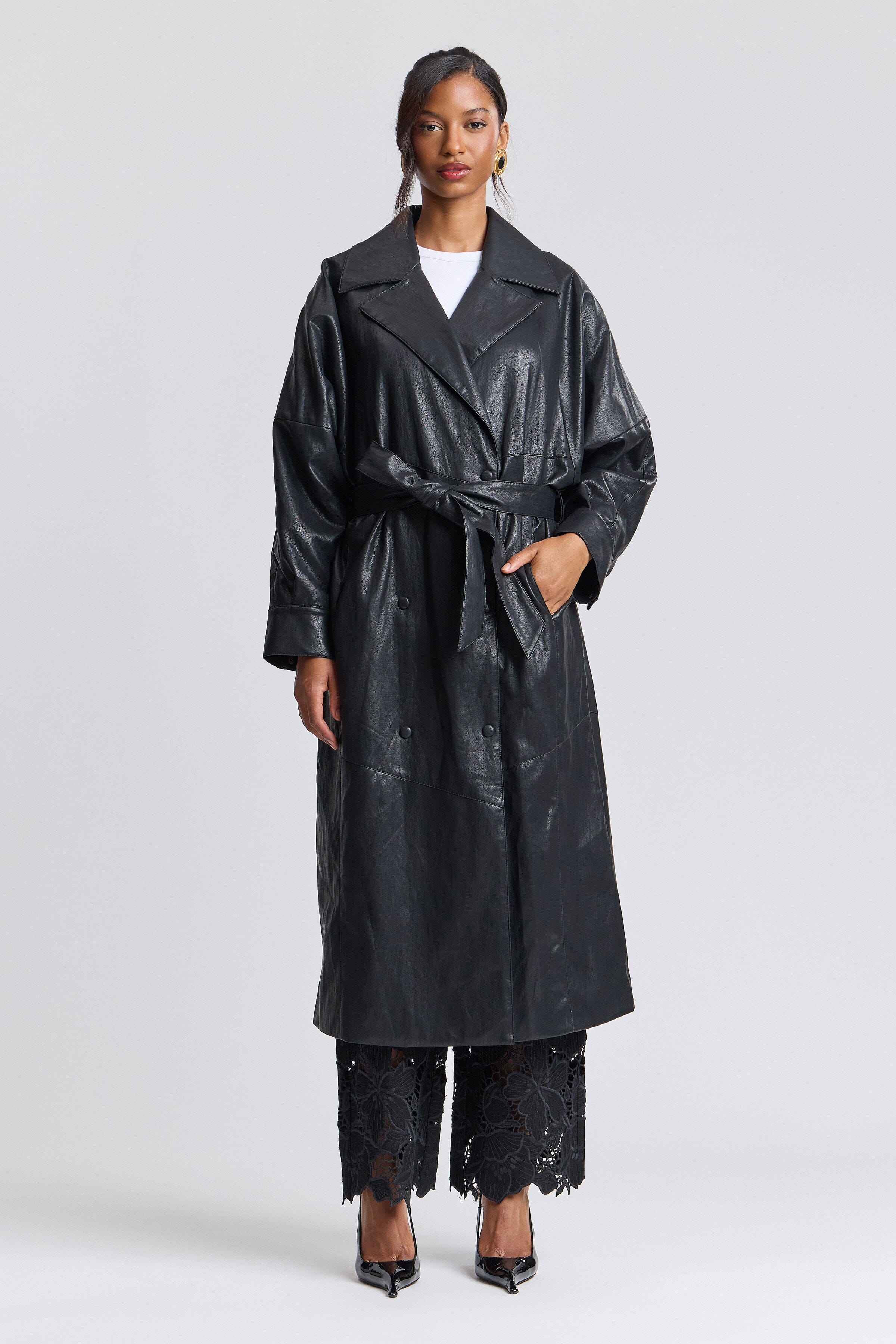 Double-breasted long black leather trench coat with adjustable belt - Shop women's cute trench coats by Avec Les Filles.