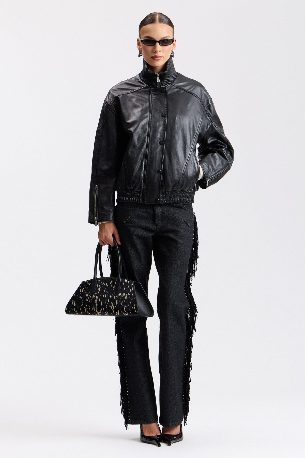 Black oversized jacket in genuine leather with a front zip - Shop designer women's jackets by Avec Les Filles.