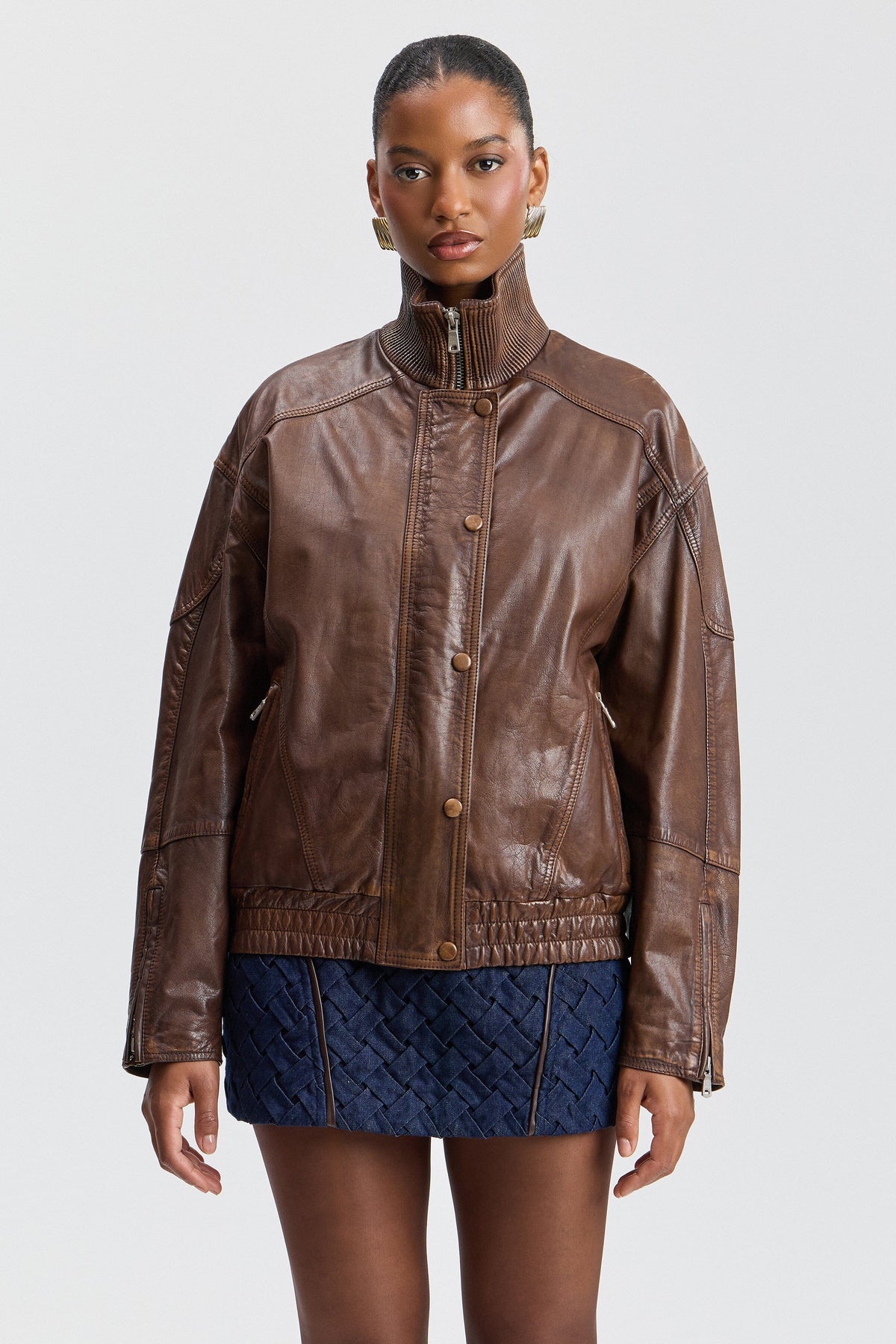 Brown oversize bomber jacket with a front zip and snap buttons - Shop women's jackets by Avec Les Filles.