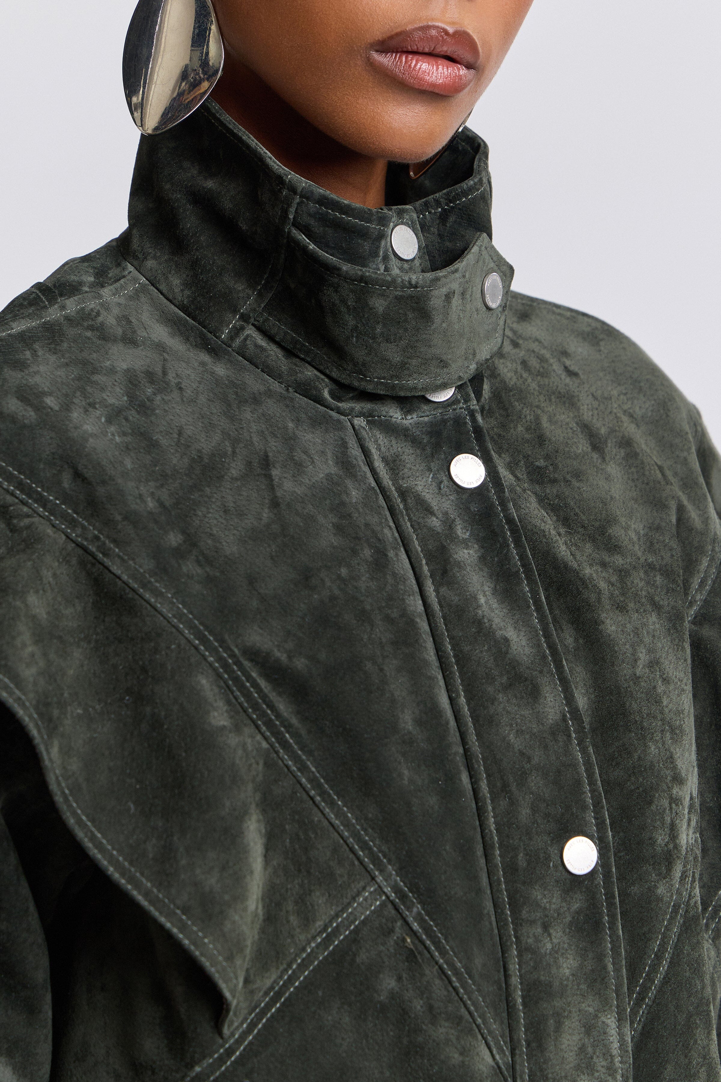 Suede green bomber jacket women with snap-front and high stand collar - Shop designer jackets by Avec Les Filles.