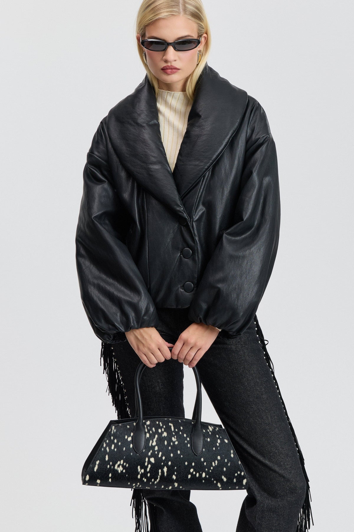 Black faux leather jacket with shawl collar and button front. Shop women's cute black puffer jackets by Avec Les Filles. 