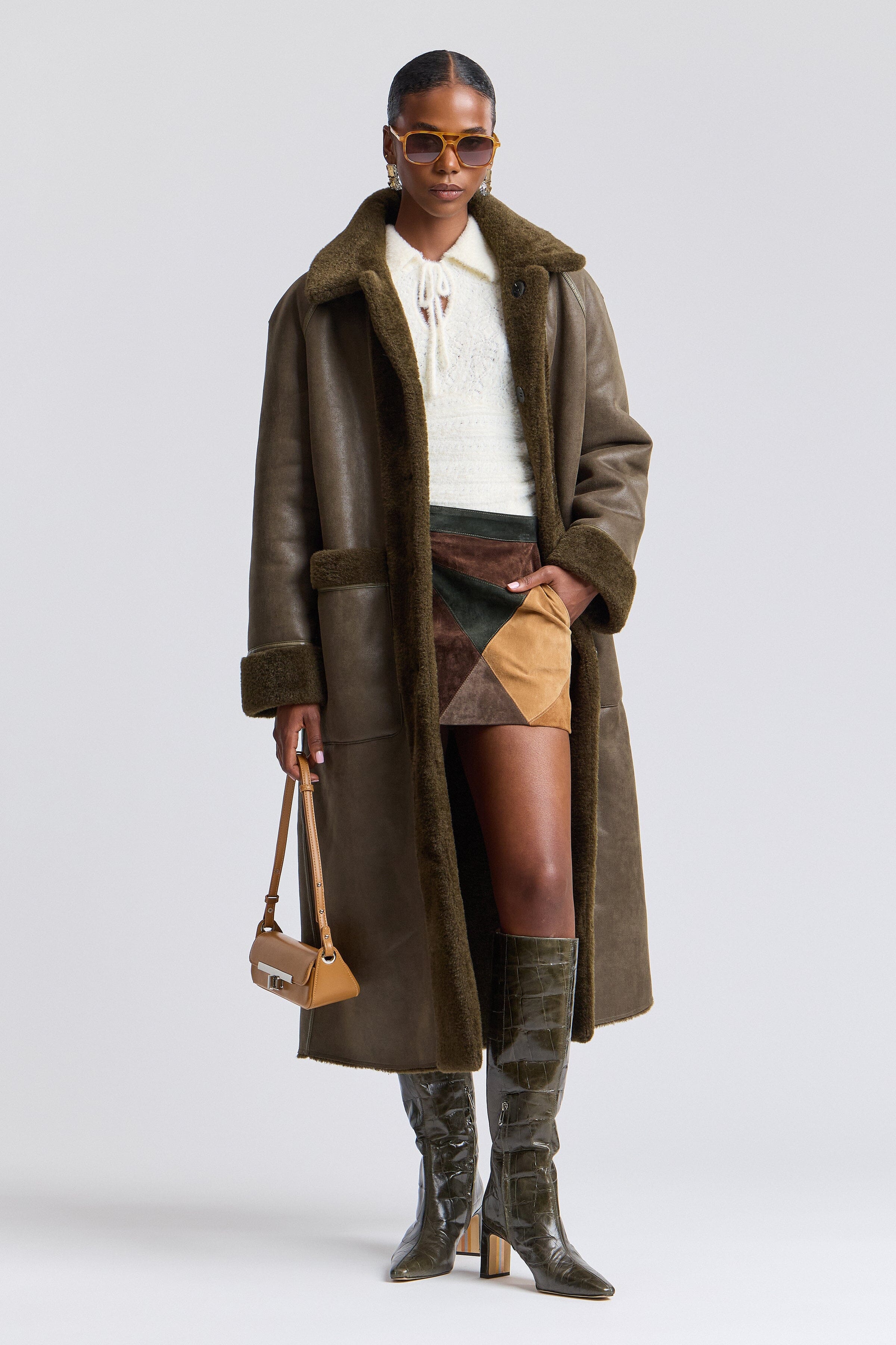 Reversible dark olive faux fur coat with raglan sleeves - Shop designer women's long maxi coats by Avec Les Filles.