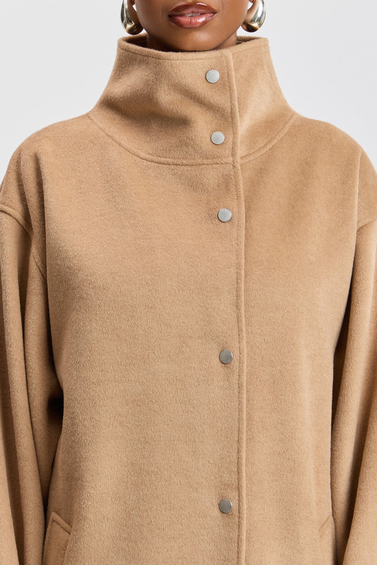 Double-faced faux wool oversized long coat funnel neck with snap front. Shop women's coats by Avec Les Filles.