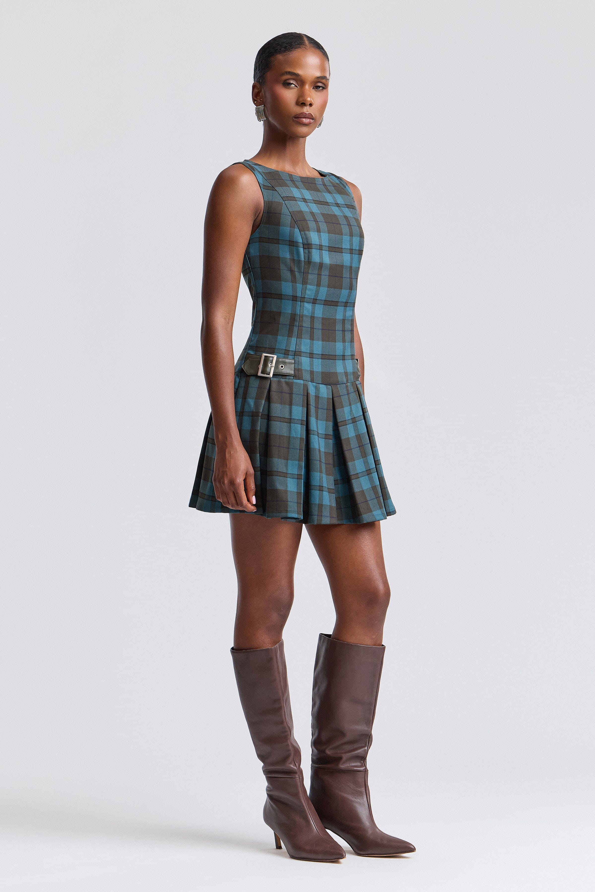 women's blue plaid dress with pleated drop-waist and boat neckline. Shop cute mini dresses by Avec Les Filles.