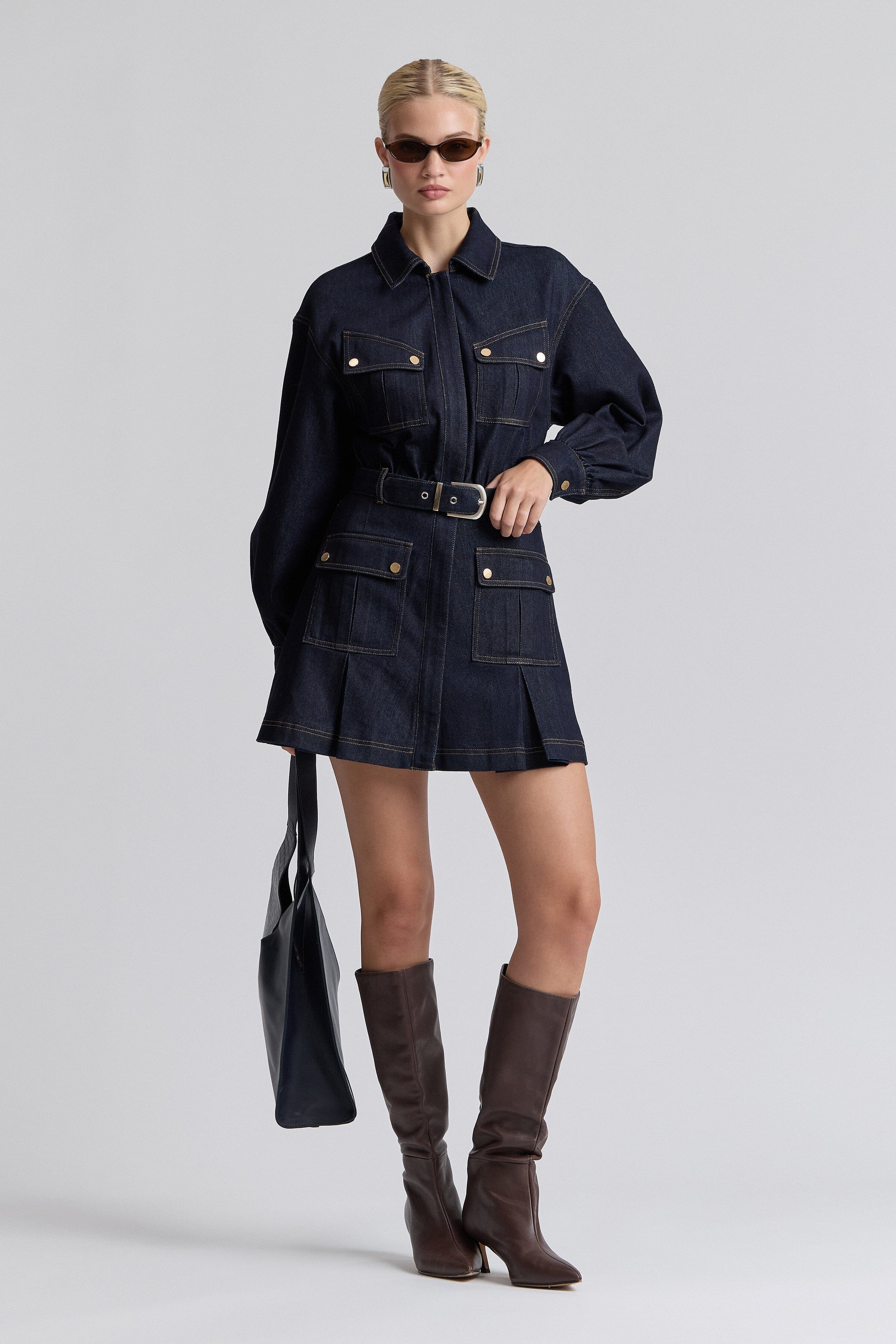 Indigo blue oversized denim shirt dress with long blouson sleeves and a removable belt by Avec Les Filles.