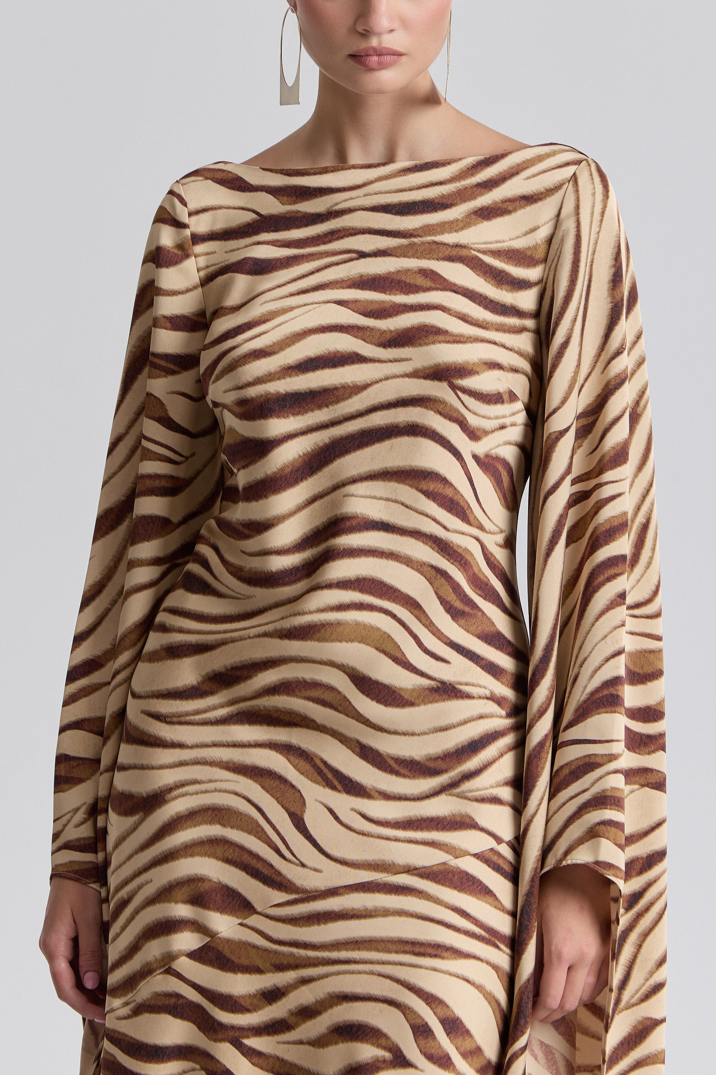Satin zebra print formal dress with boat neck and high-low sleeves - Shop women's maxi dresses by Avec Les Filles.