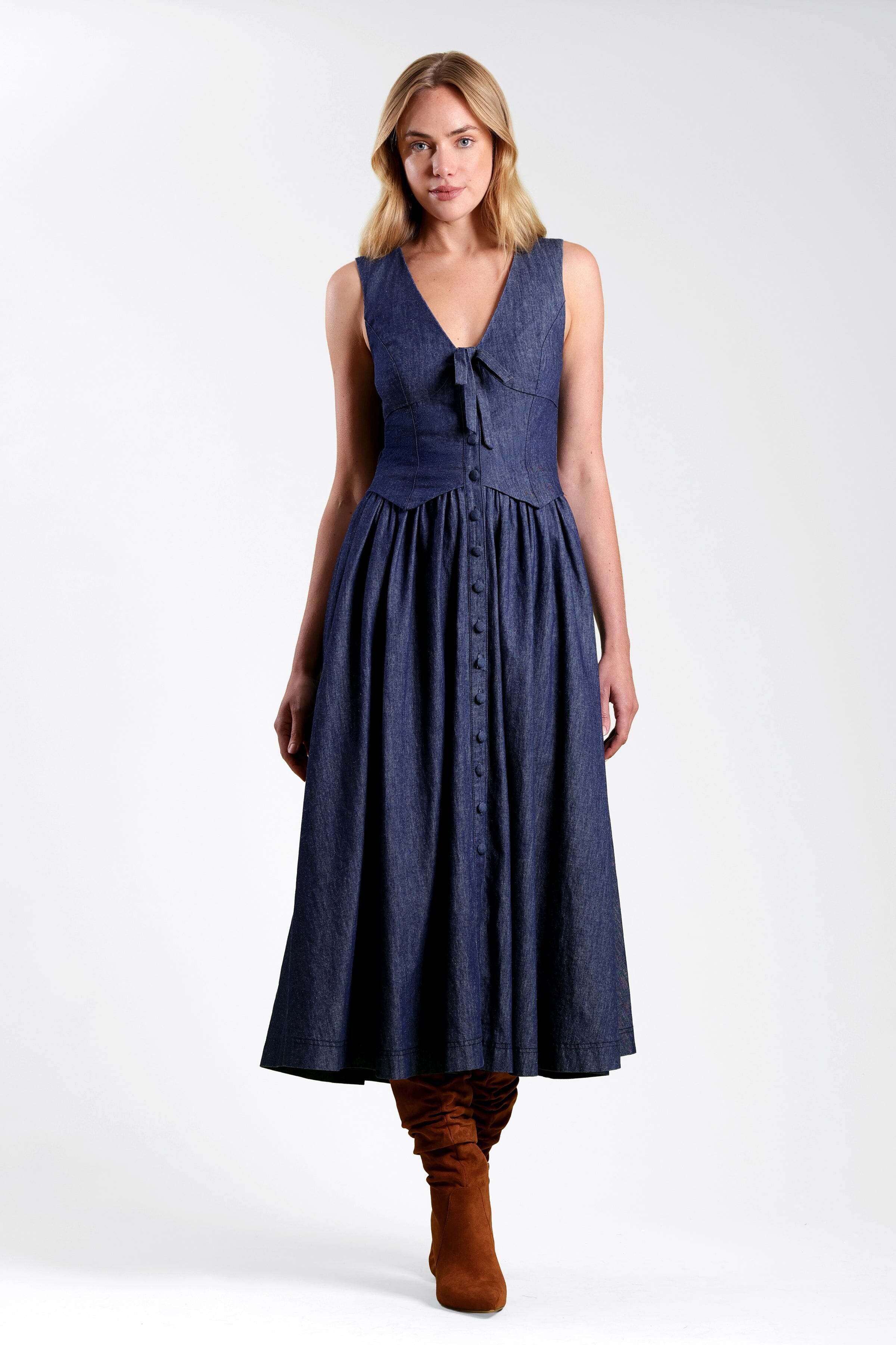 Drop-waist maxi sleeveless denim dress in cotton with tie-front and deep V-neck - Shop denim dresses by Avec Les Filles.