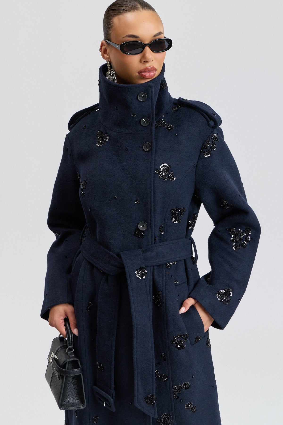 Sequin-embellished navy coat with a high funnel collar and a belt - Shop designer women's trench coats by Avec Les Filles.