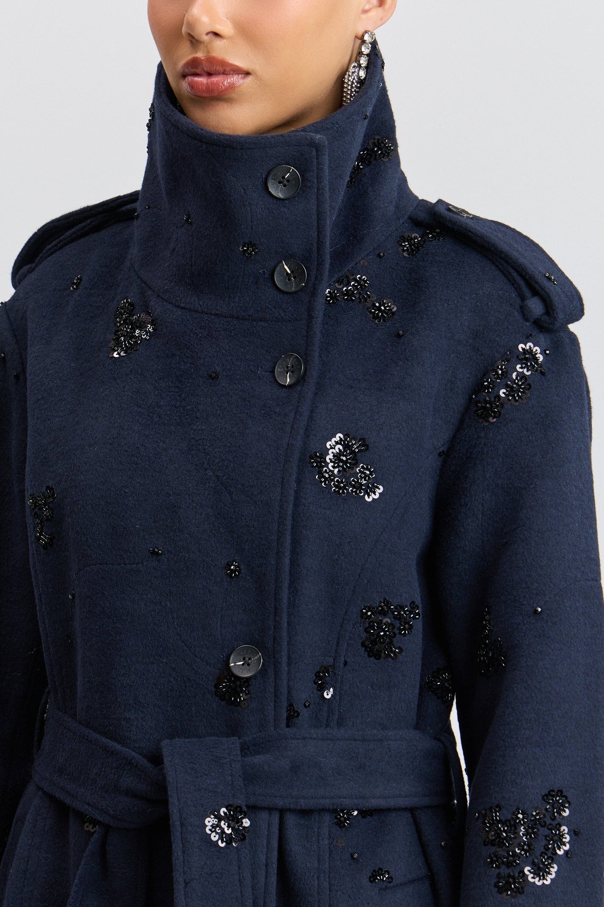 Sequin-embellished navy trench coat with a high funnel collar - Shop designer women's trench coat by Avec Les Filles.