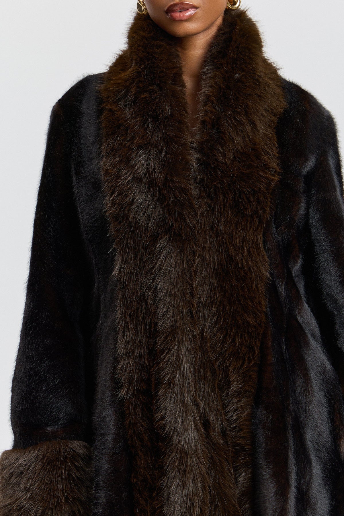 Tipped fit-and-flare black faux fur jacket with shawl collar. Shop designer women's cute faux fur jackets by Avec Les Filles.
