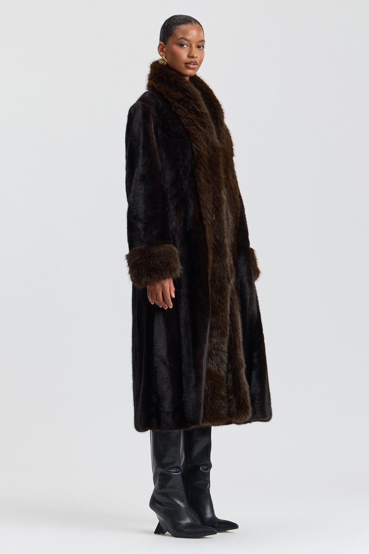 Tipped fit-and-flare black long faux fur coat with shawl collar. Shop women's cute faux fur jackets by Avec Les Filles.