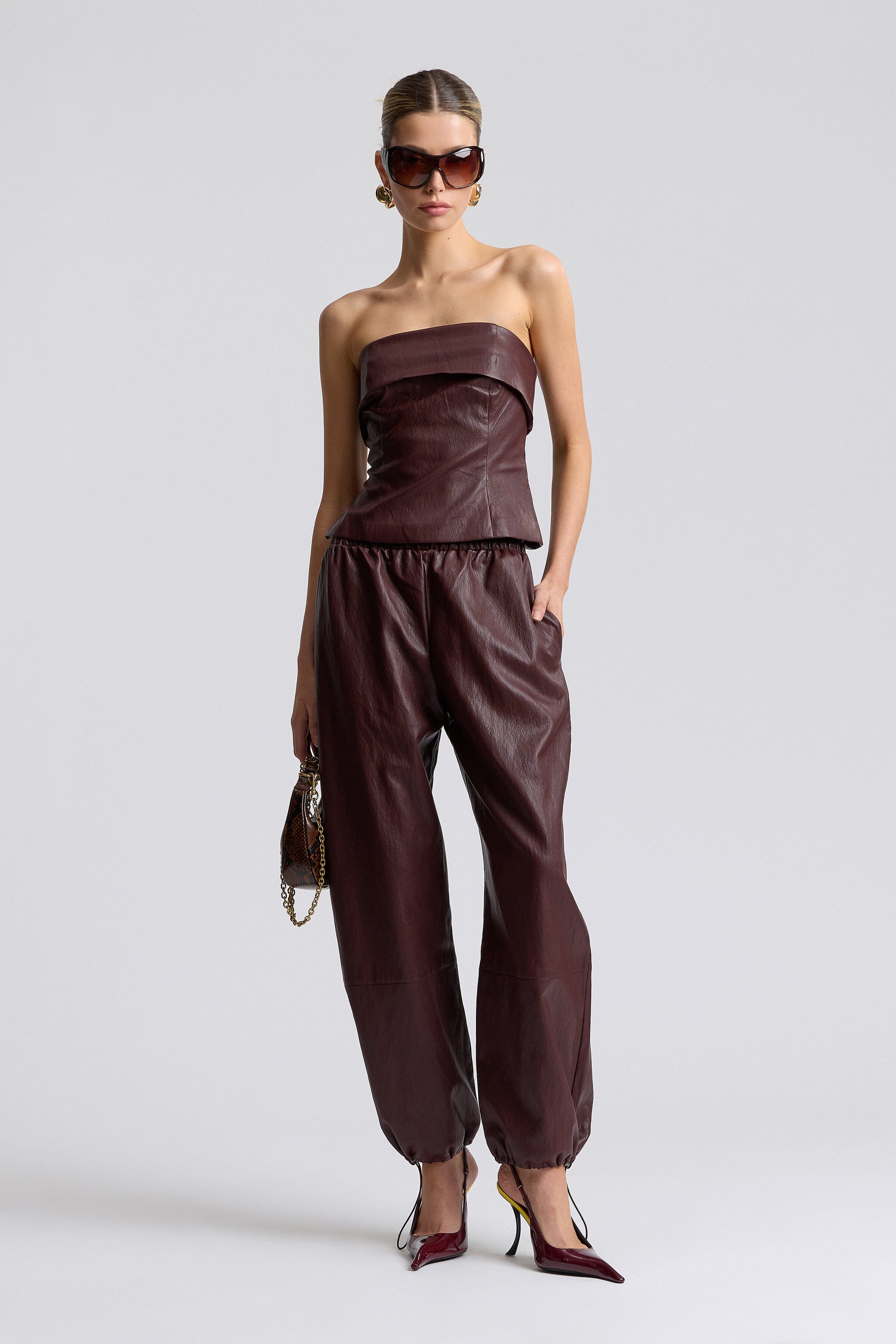 Dark brown faux leather tube top with side slits and faux leather pants - Shop cute tops & pants by Avec Les Filles.