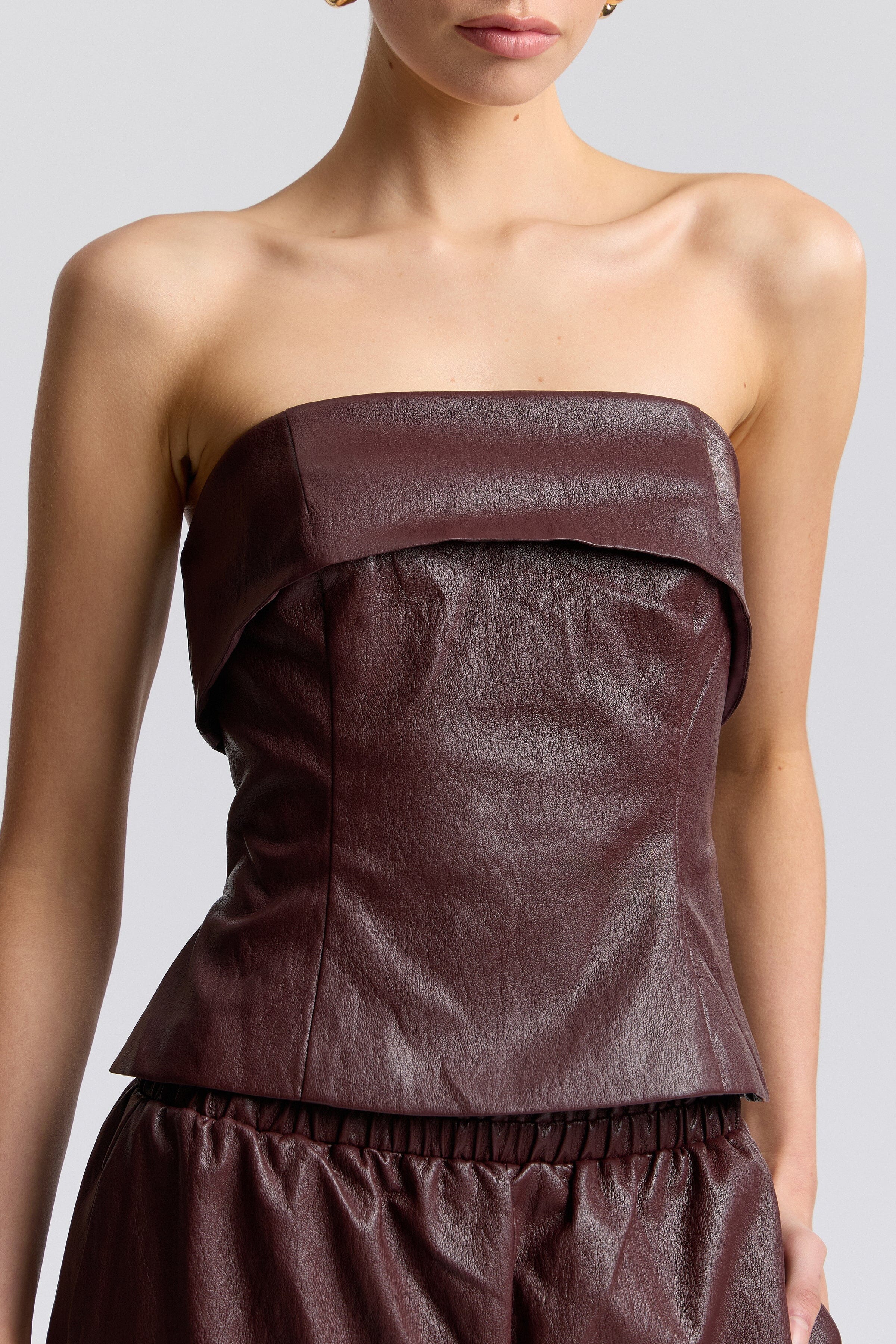 Dark brown faux leather fitted tube top with foldover neck and side slits - Shop cute tube tops by Avec Les Filles.
