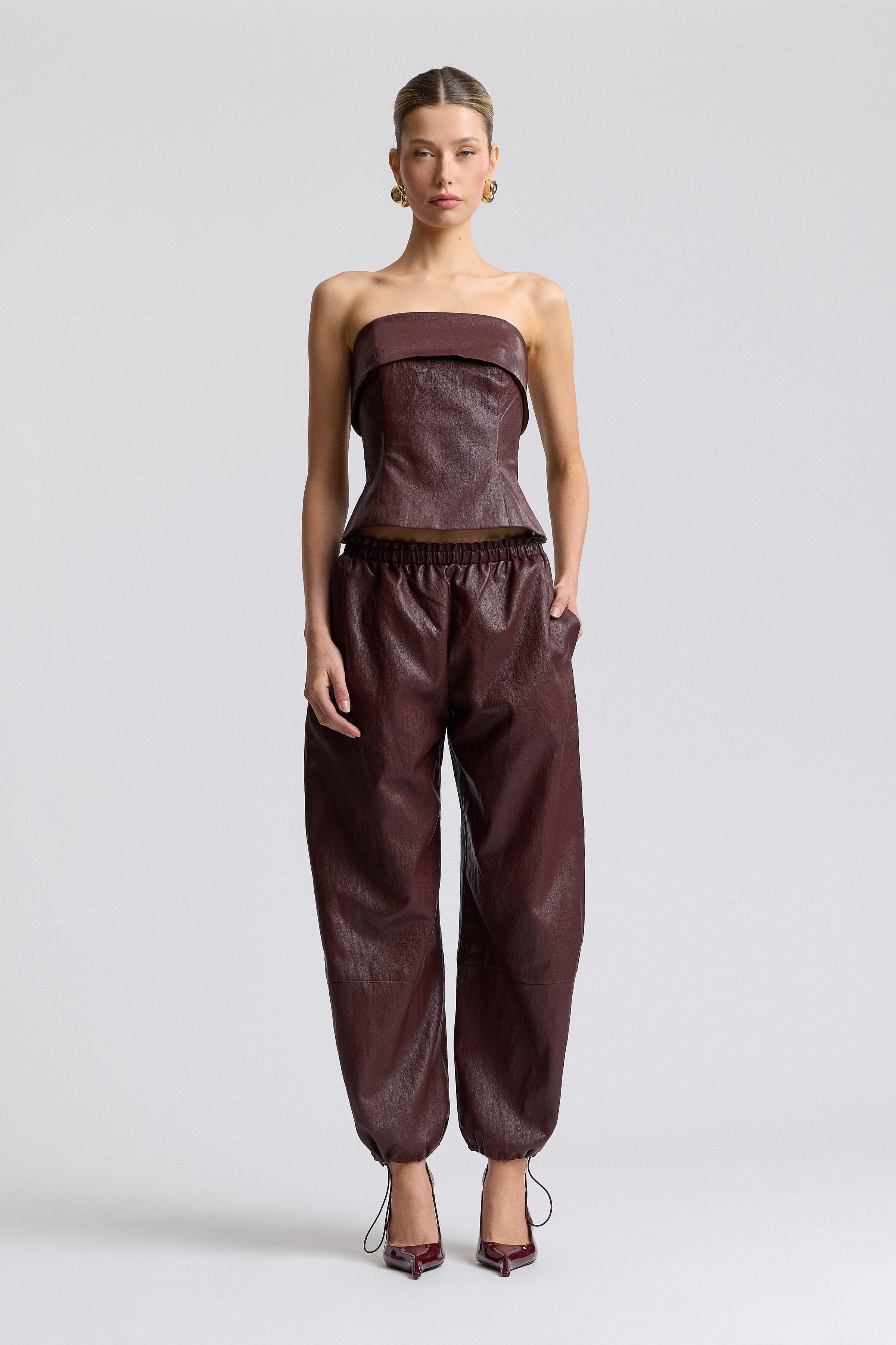 Dark brown faux leather joggers with faux leather tube top - Shop designer women's cute tops & joggers by Avec Les Filles.