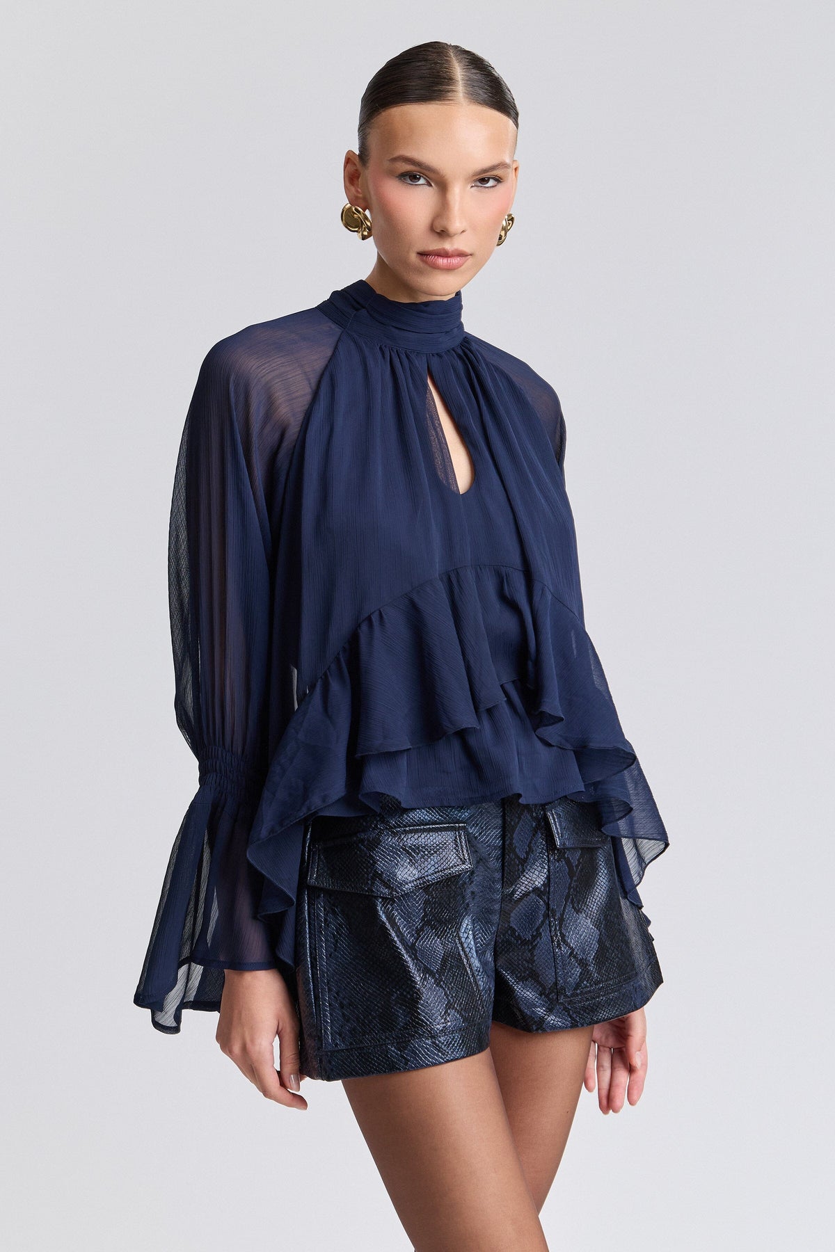 Ruffle flowy blue top with long sleeves and a high-low layered hem - Shop cute navy blue tops by Avec Les Filles.