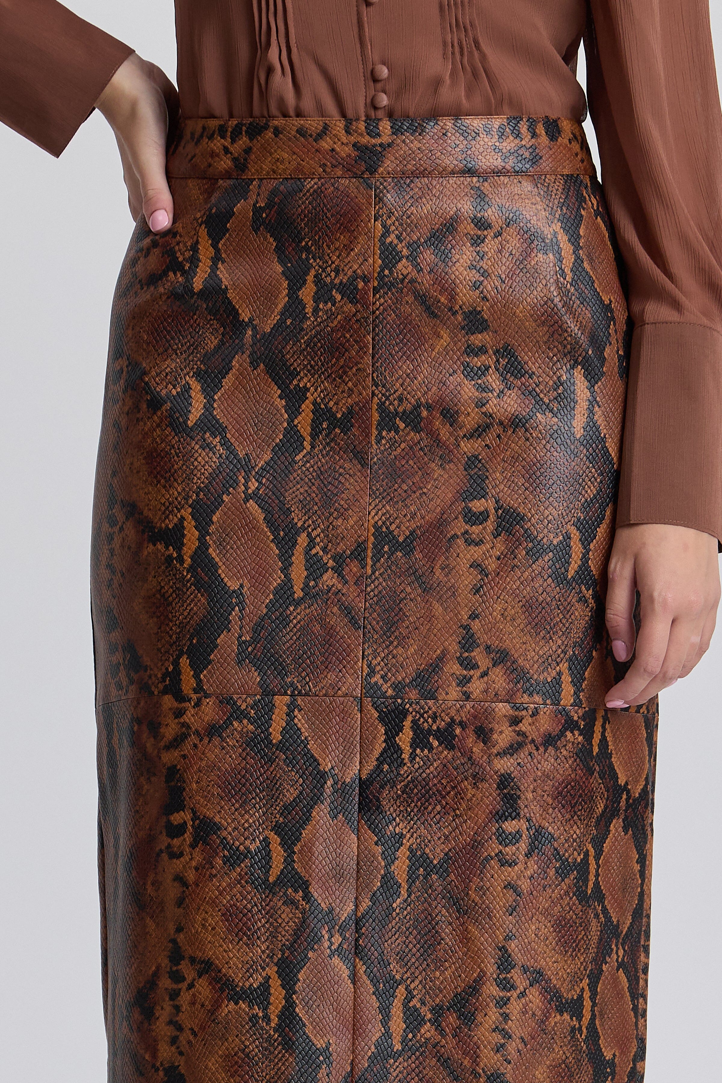 Brown snake print faux leather skirt with a structured waistband - Shop designer women's maxi skirts by Avec Les Filles.