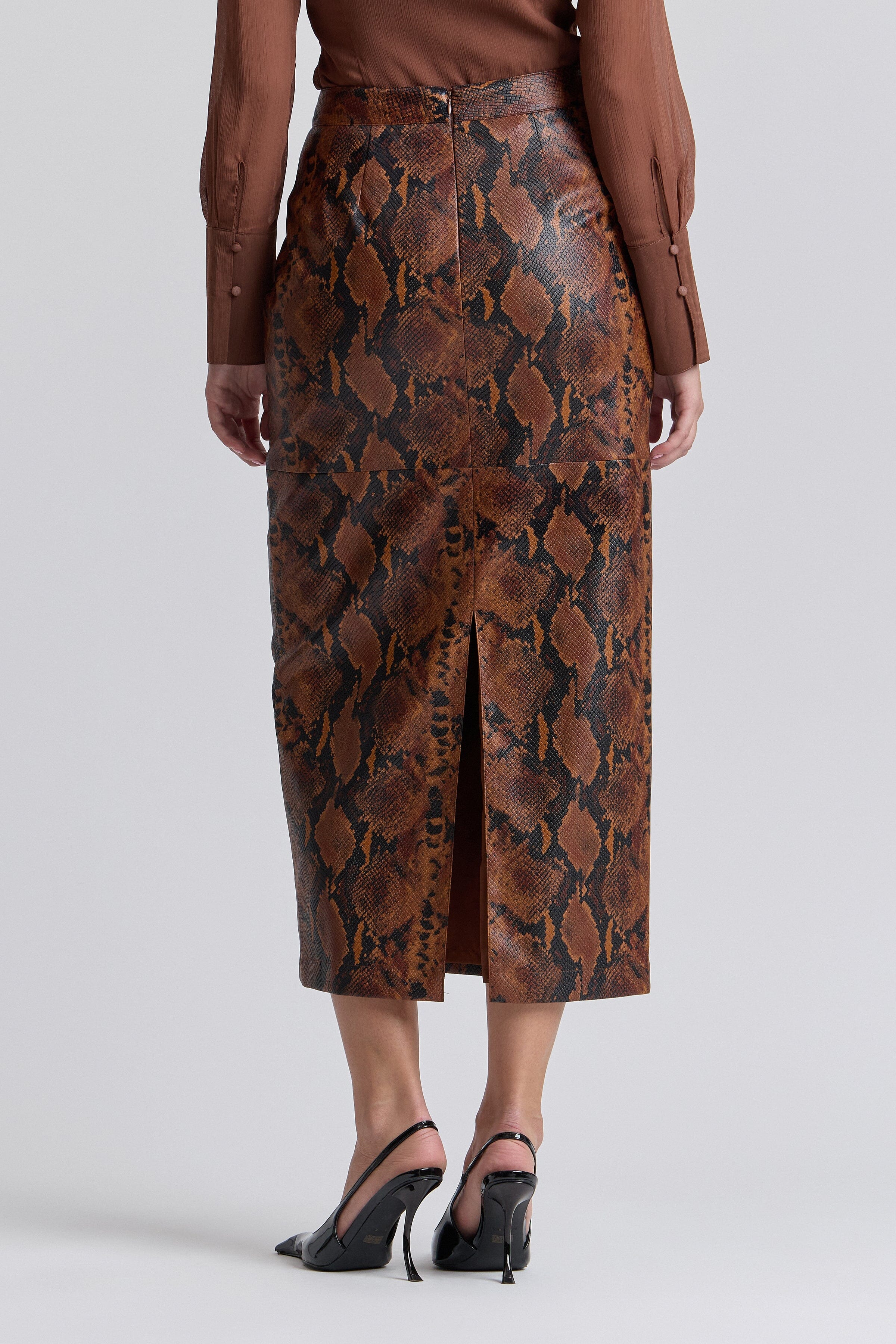 Brown snake print faux midi leather skirt with structured waistband - Shop designer women's maxi skirts by Avec Les Filles.