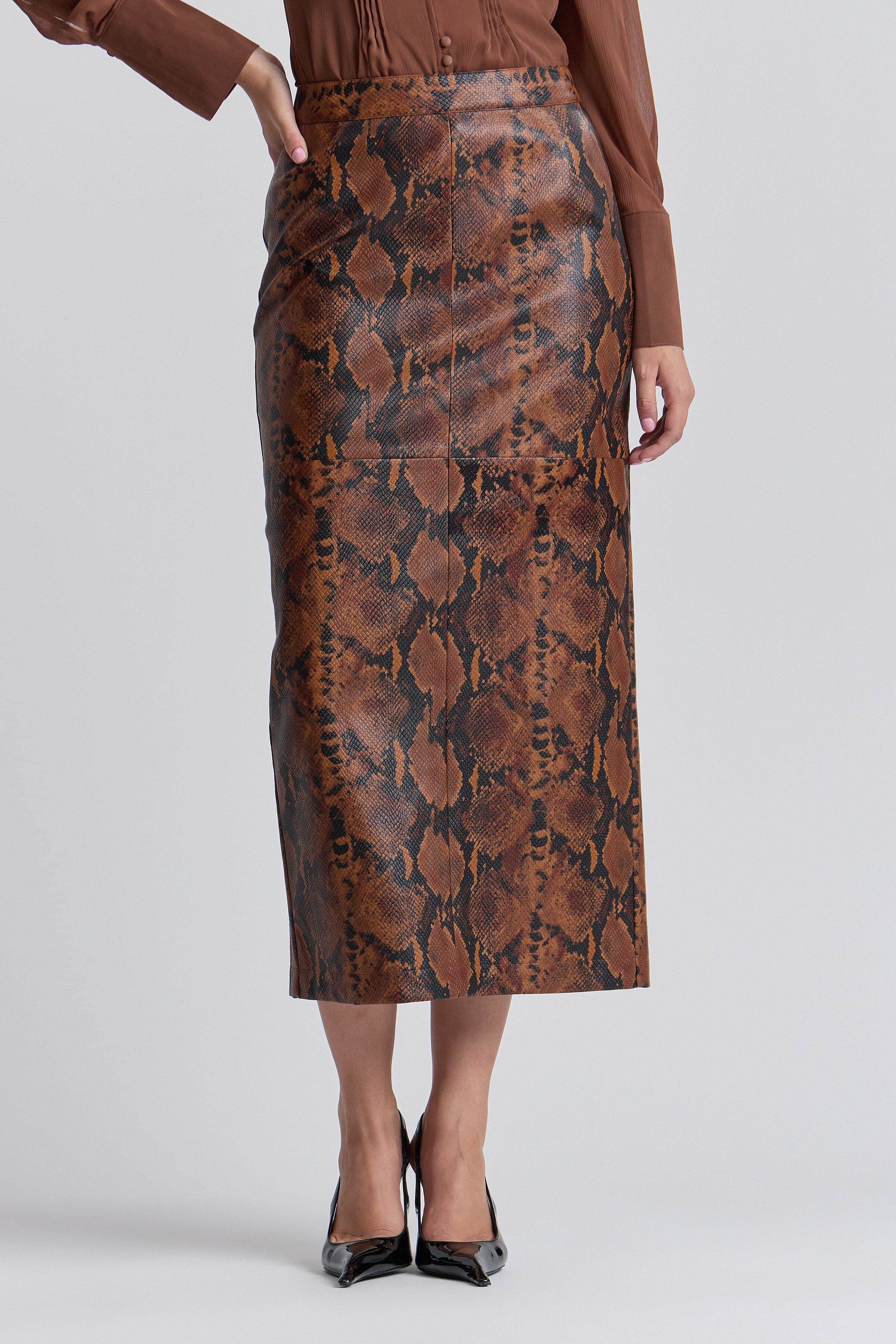 Brown faux leather skirts snake print with a structured waistband - Shop designer women's maxi skirts by Avec Les Filles.