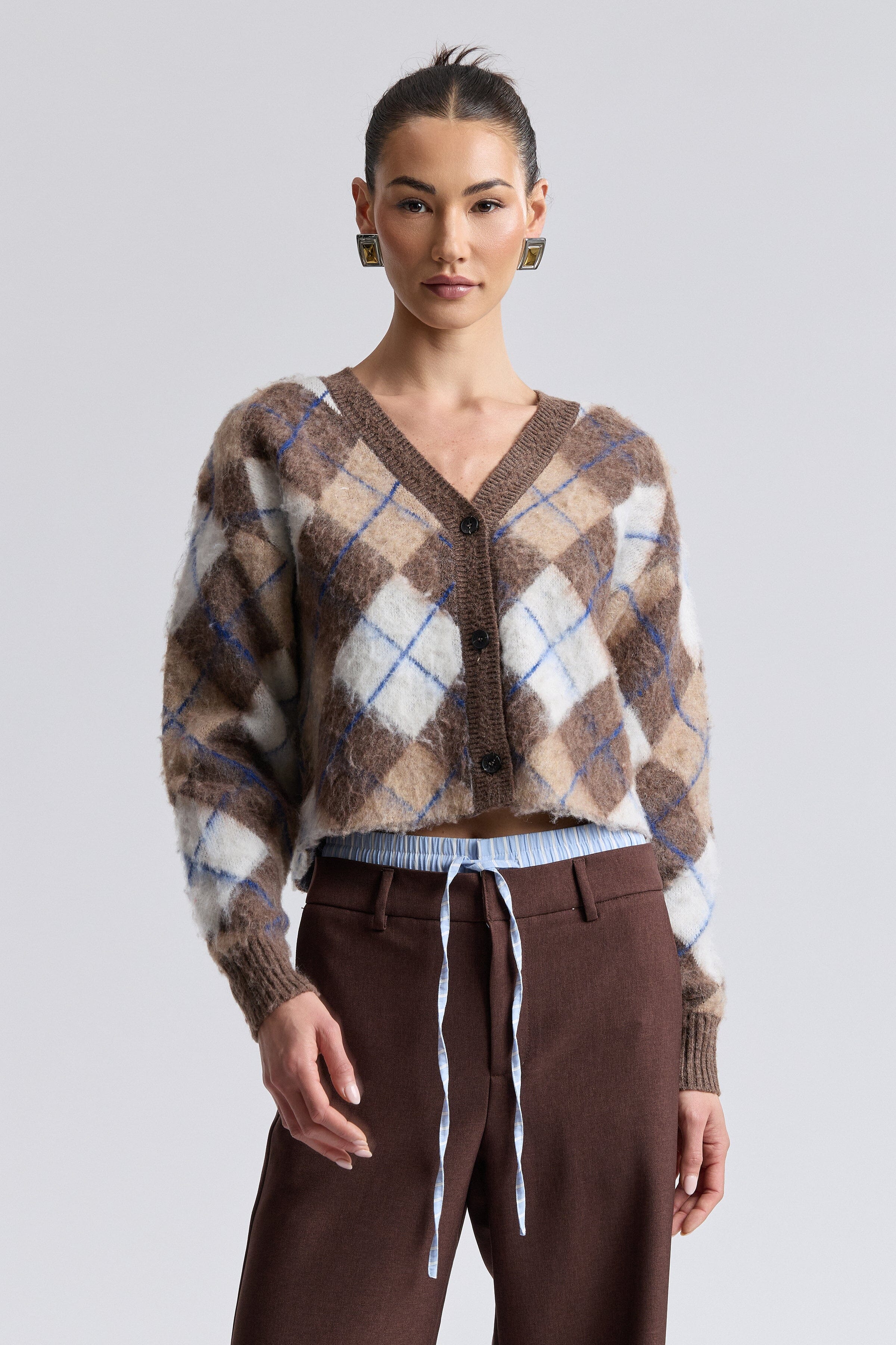 Jacquard brown cropped cardigan with a button front and long balloon sleeves by Avec Les Filles.