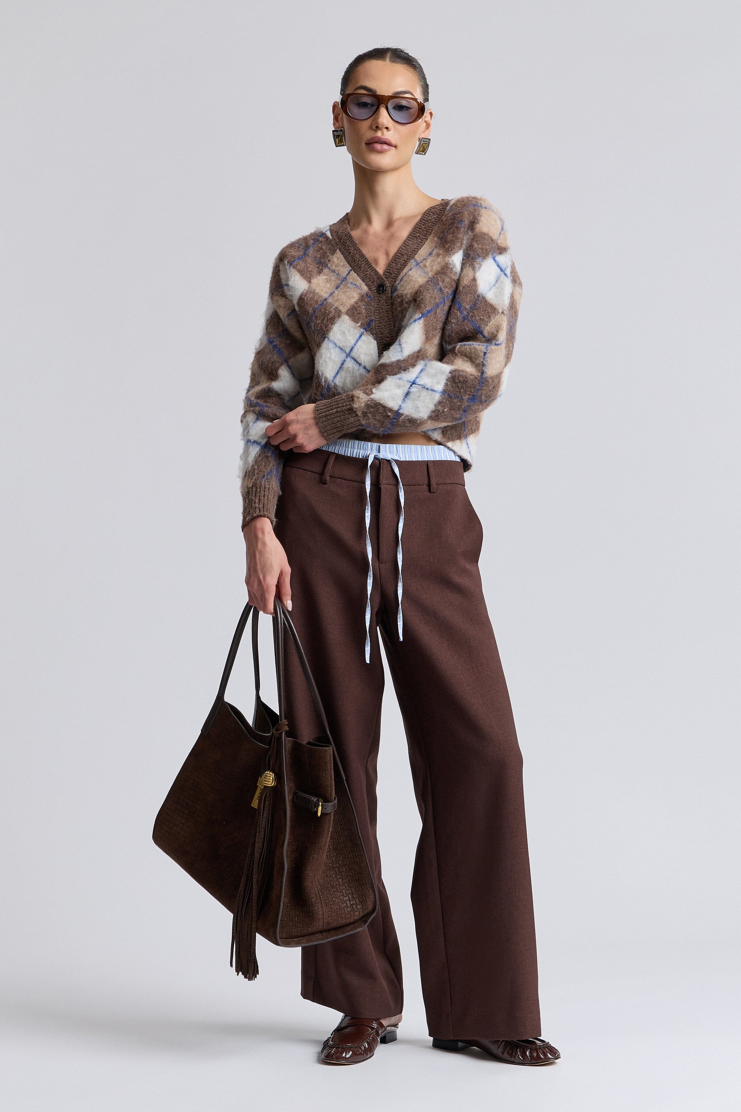 Jacquard crop brown sweater with a button front and long balloon sleeves. Shop cute cardigan by Avec Les Filles.