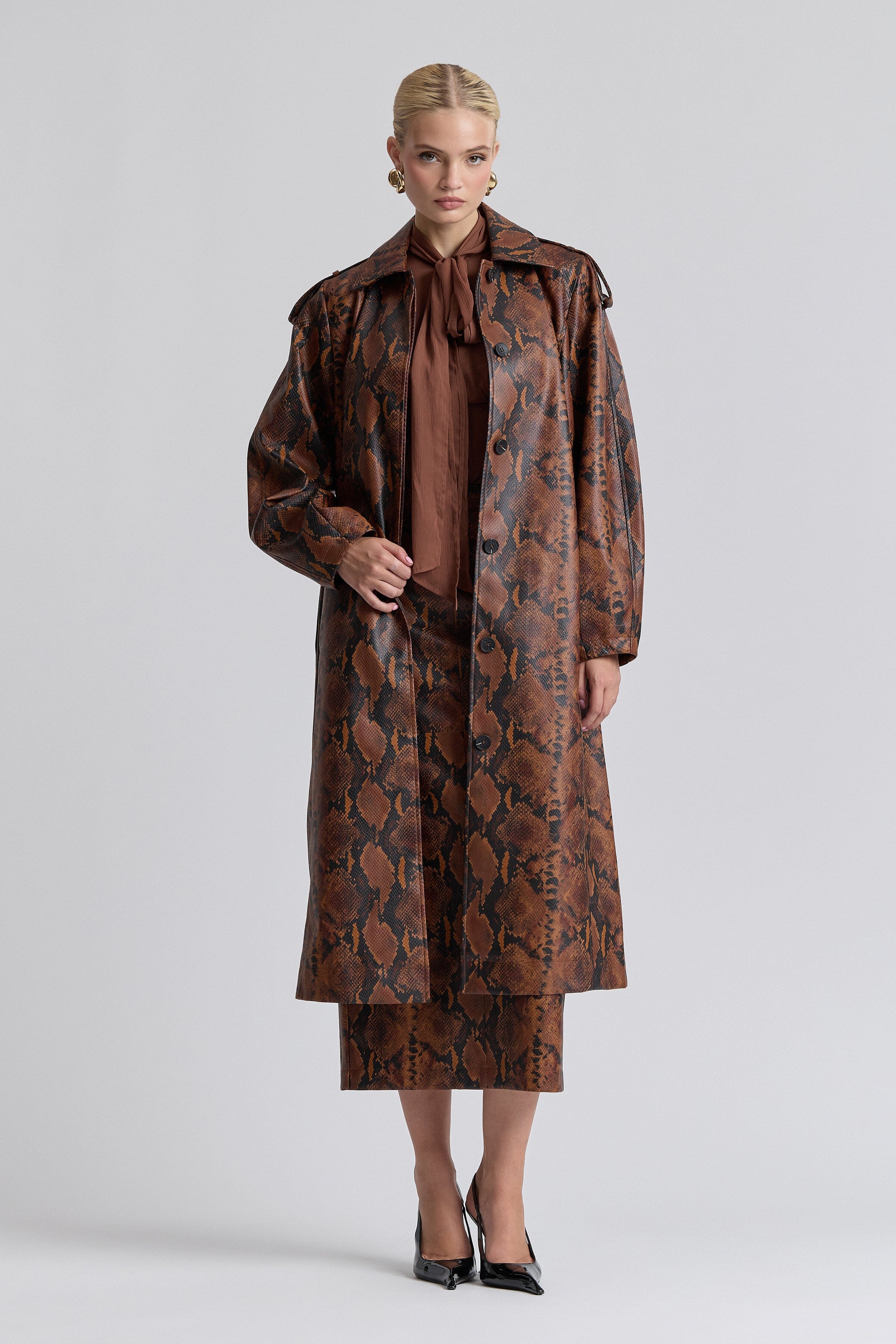 Faux leather button-front brown snake print trench coat with long barrel sleeves - Shop women's coats by Avec Les Filles.