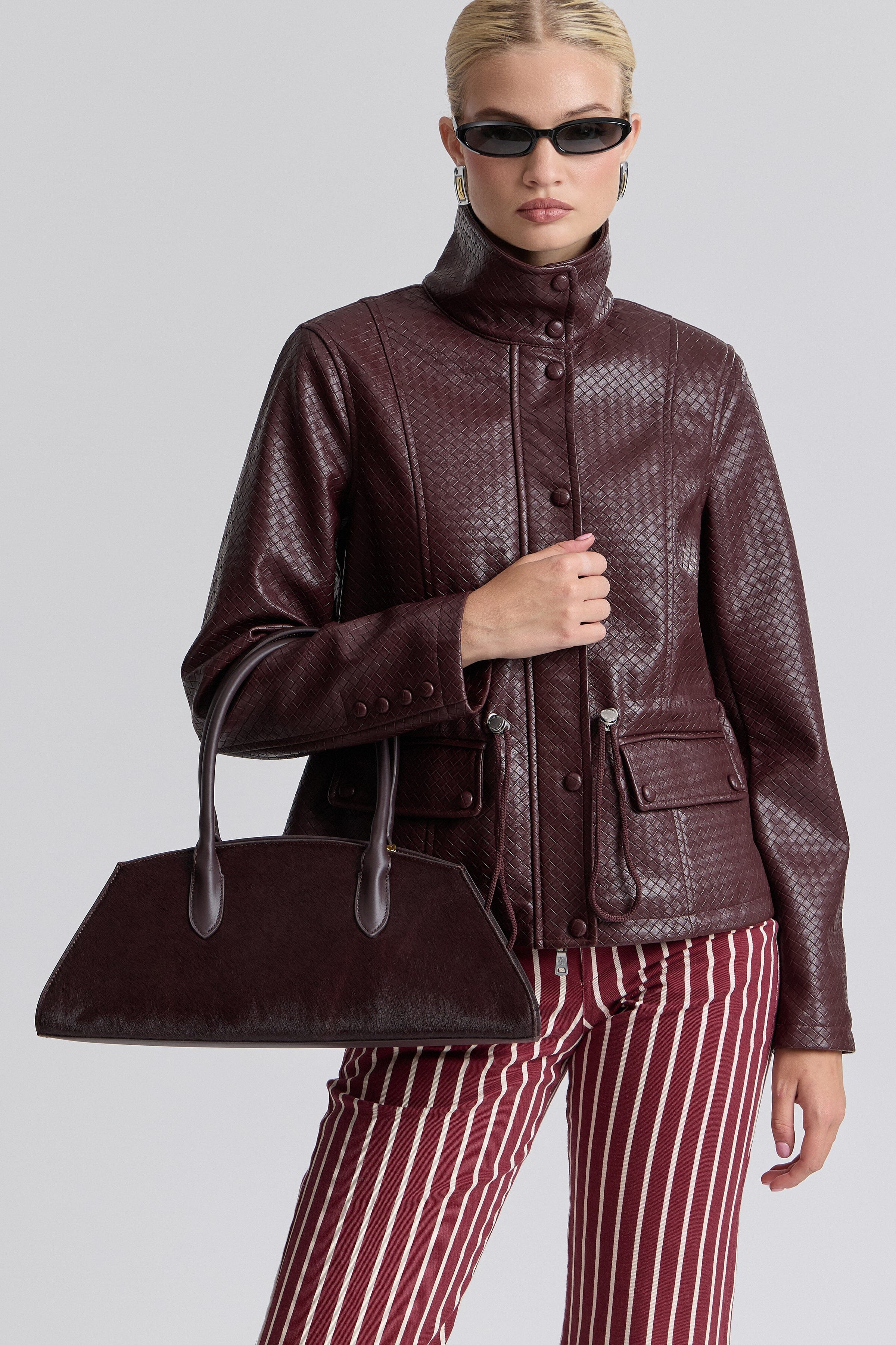 Basketweave burgundy cropped faux leather jacket with adjustable waist - Shop women's crop jackets by Avec Les Filles.