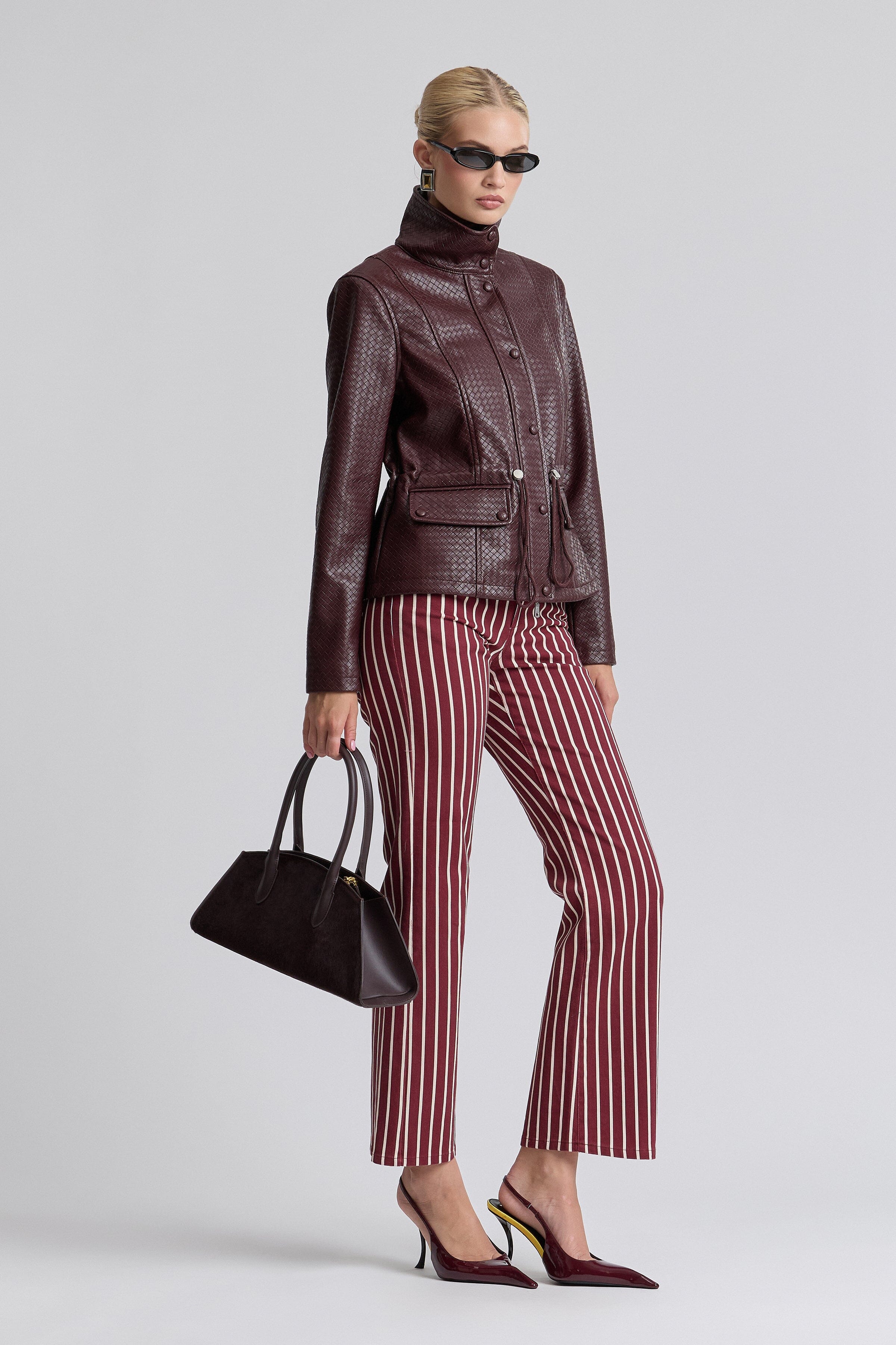 Basketweave burgundy crop leather jacket​ with adjustable waist and zip-front - Shop women's crop jackets by Avec Les Filles.