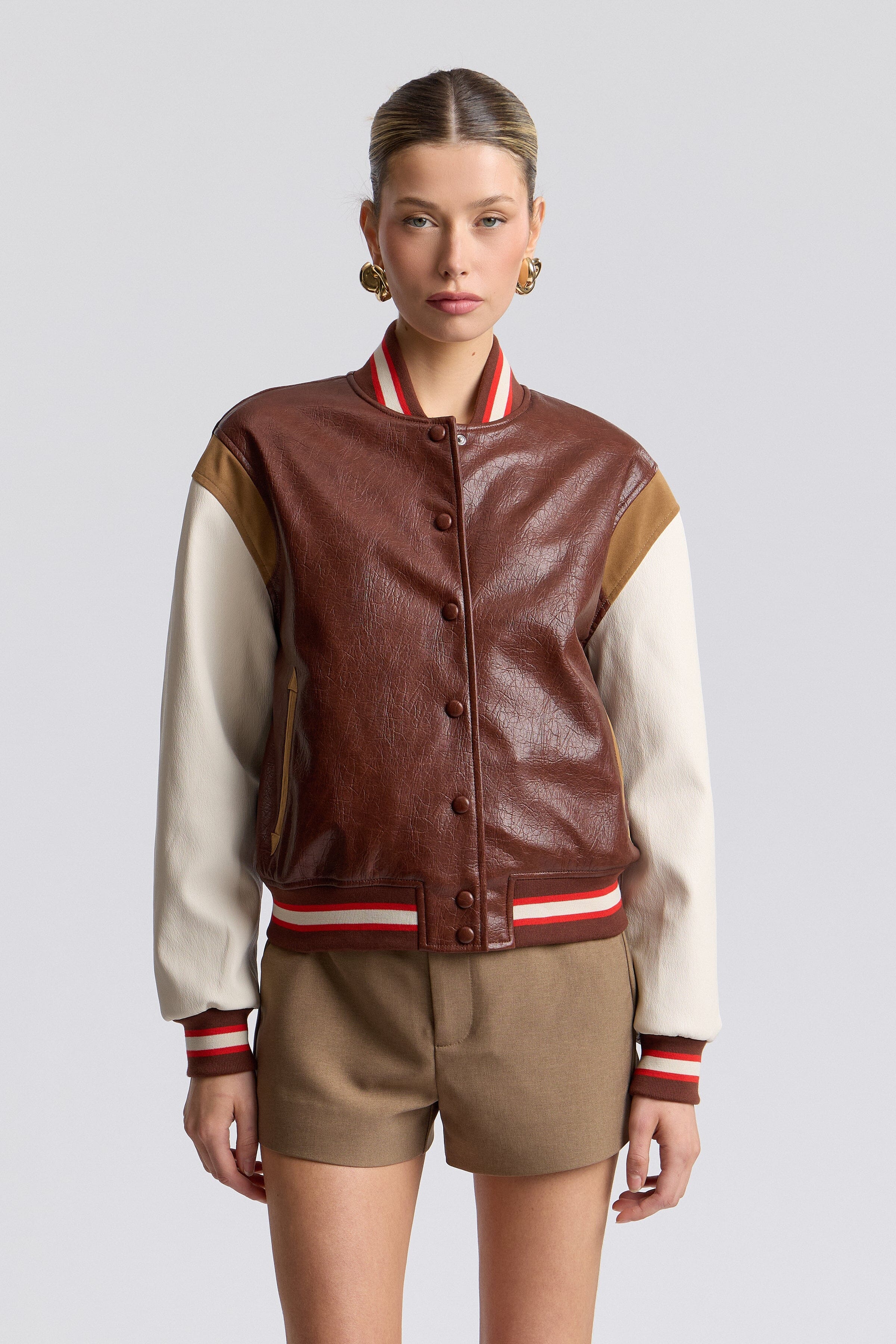 Faux-leather red varsity jacket women with a snap-button front and long sleeves - Shop cute jackets by Avec Les Filles.