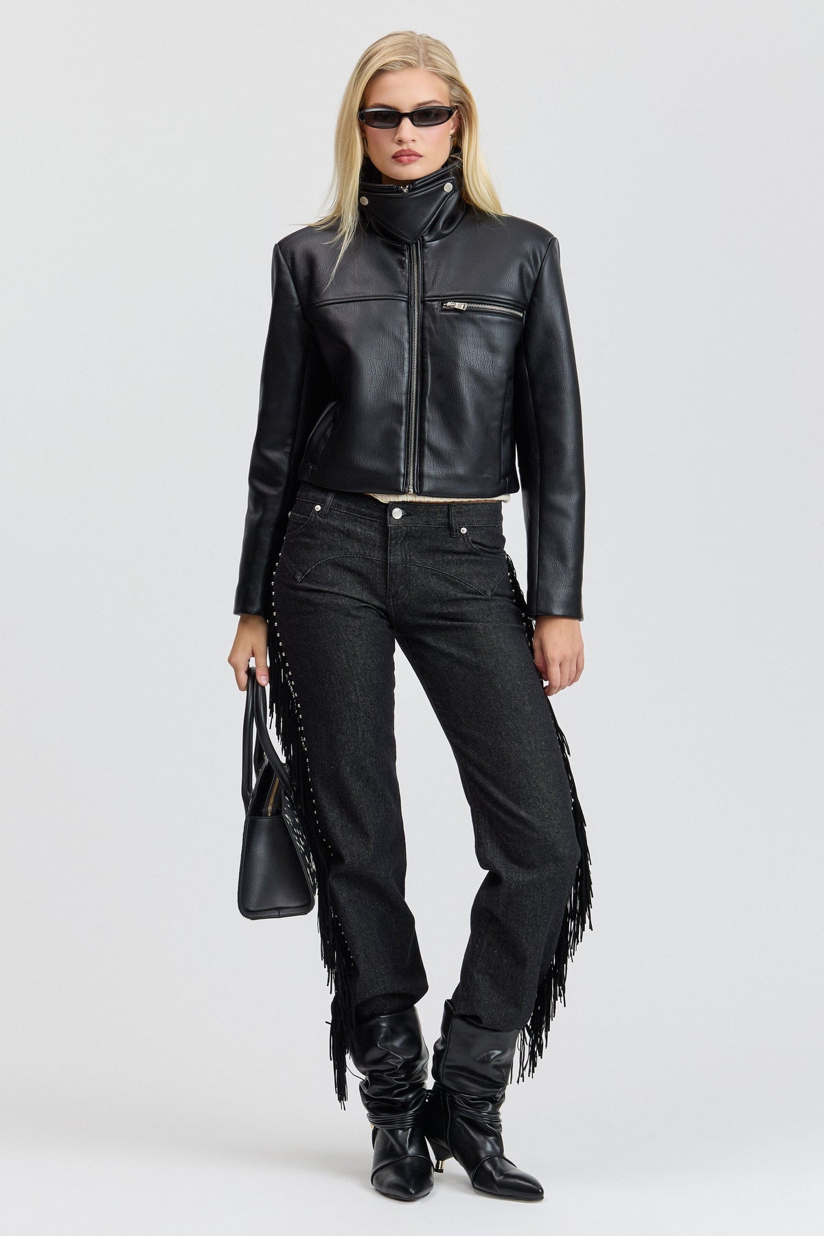 Black leather cropped moto jacket women with stand collar. Shop designer cropped jackets by Avec Les Filles.